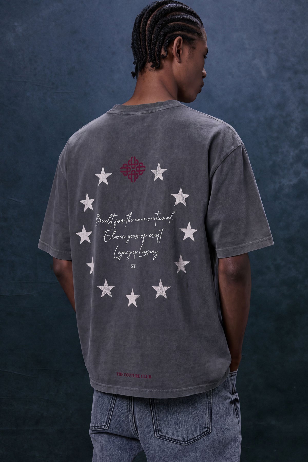 Men's Legacy Graphic T-Shirt in Washed Black – model back view showing the graphic