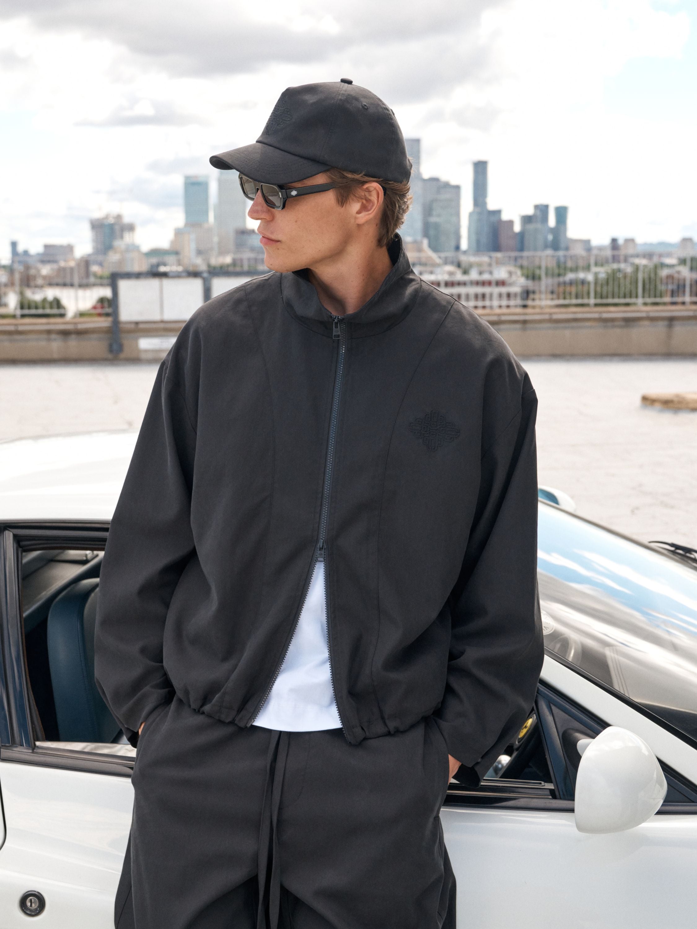 CUPRO FUNNEL NECK ZIP THROUGH - BLACK