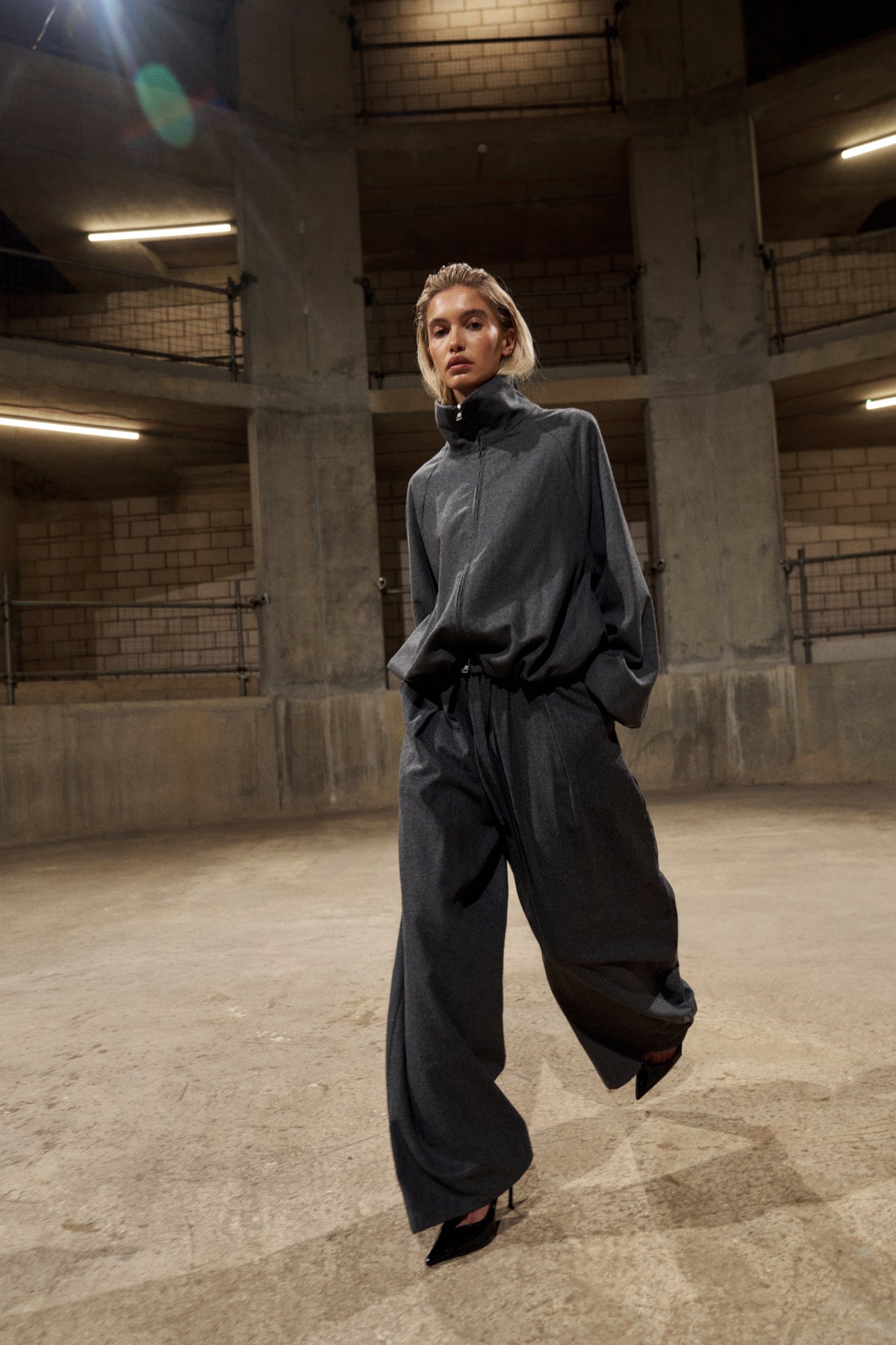 Women's Wool Drawstring Barrel Trousers in Charcoal – full-length model shot walking