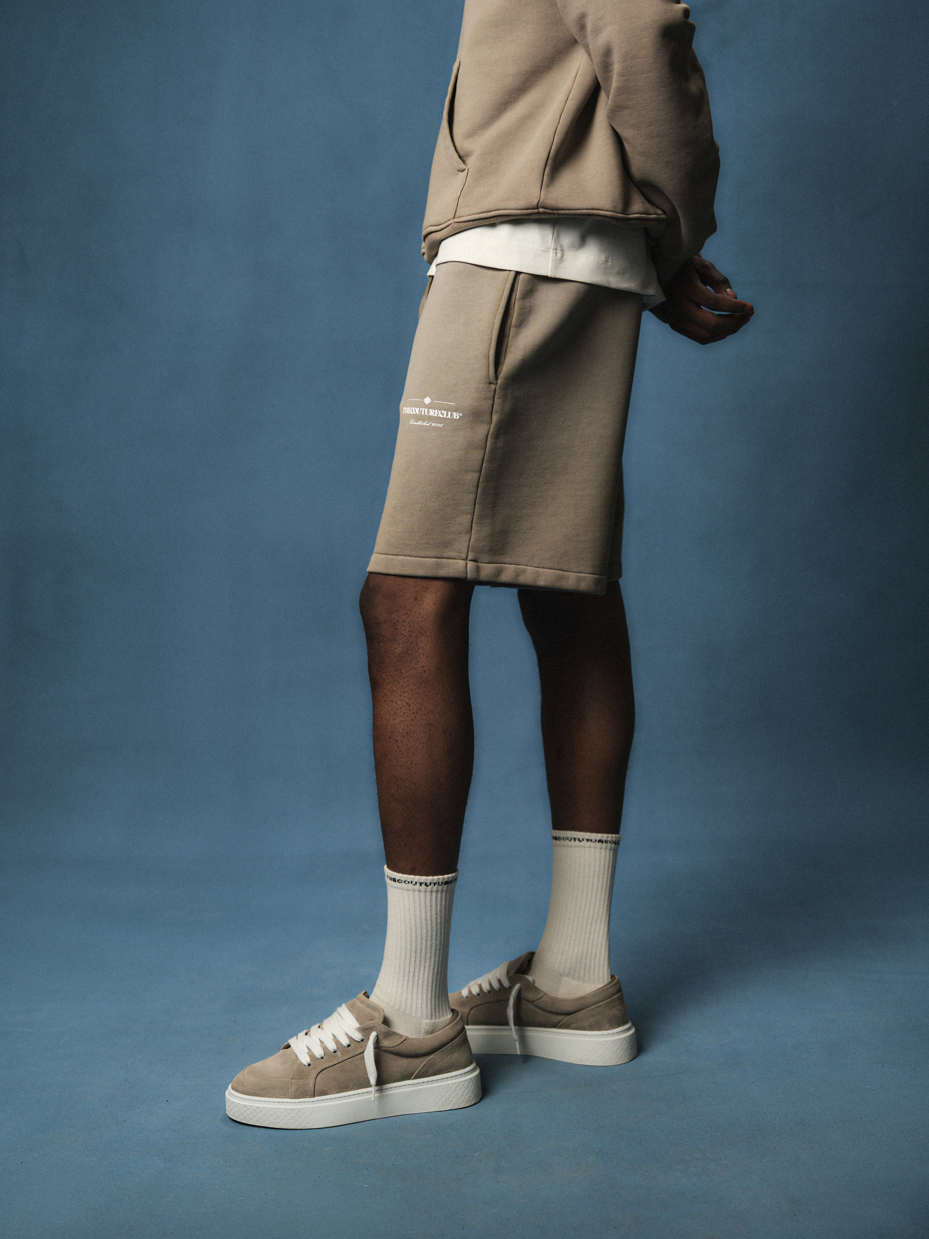 SPRAY WASH COPYRIGHT MULTI GRAPHIC SHORTS - BEIGE