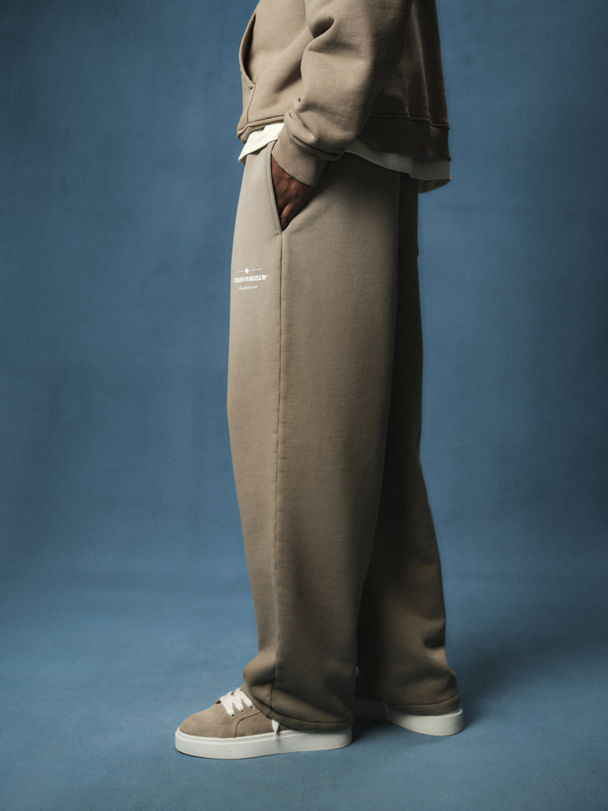 SPRAY WASH COPYRIGHT MULTI GRAPHIC JOGGERS - BEIGE