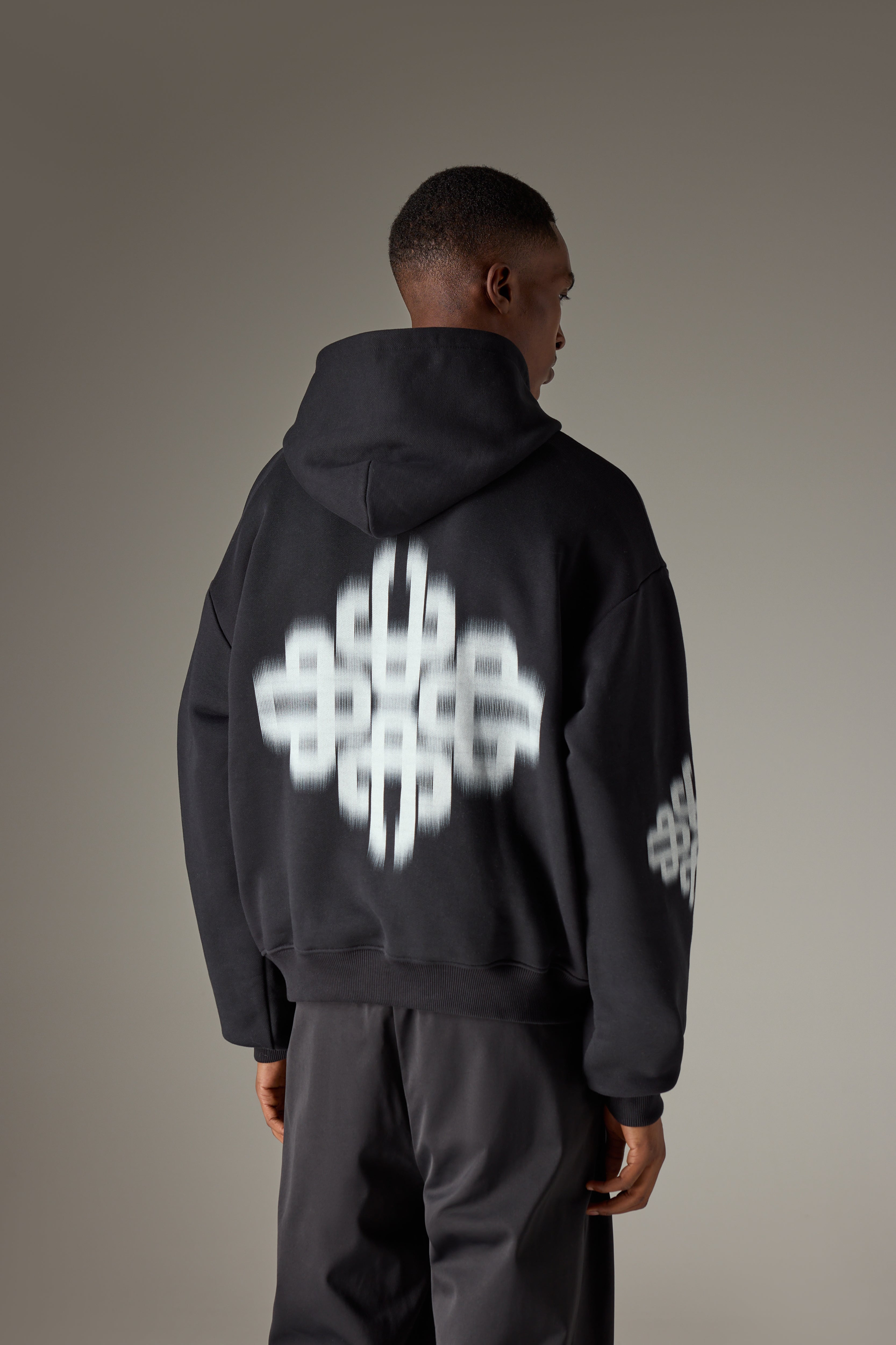 MOTION BLURRED EMBLEM HOODIE - BLACK