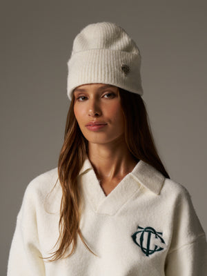 FLUFFY KNIT MONOGRAM PIN BADGE BEANIE - OFF WHITE
