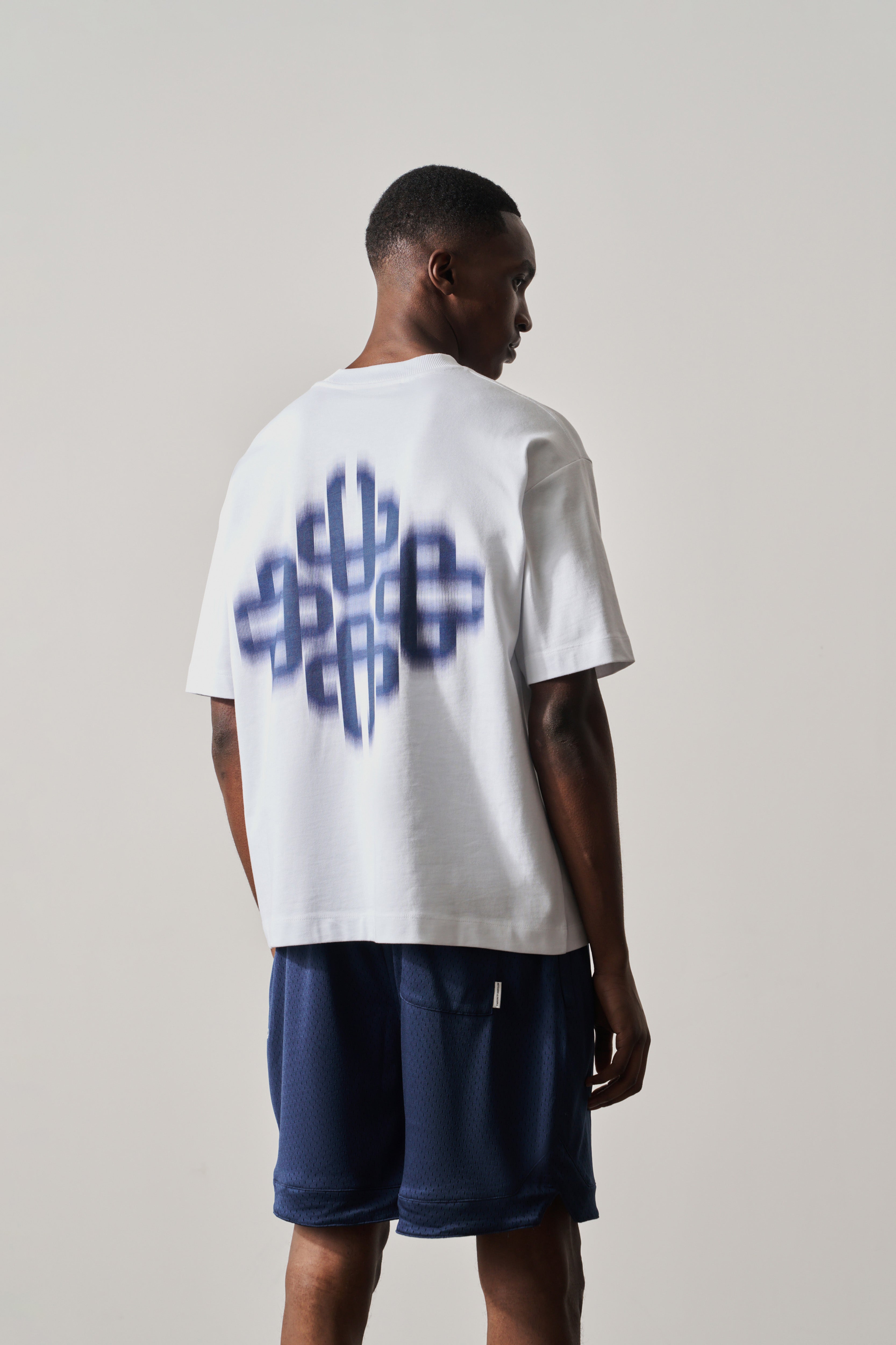 MOTION BLURRED EMBLEM T-SHIRT - NAVY