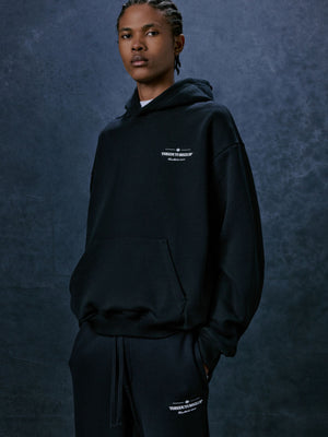COPYRIGHT MULTI GRAPHIC HOODIE - BLACK