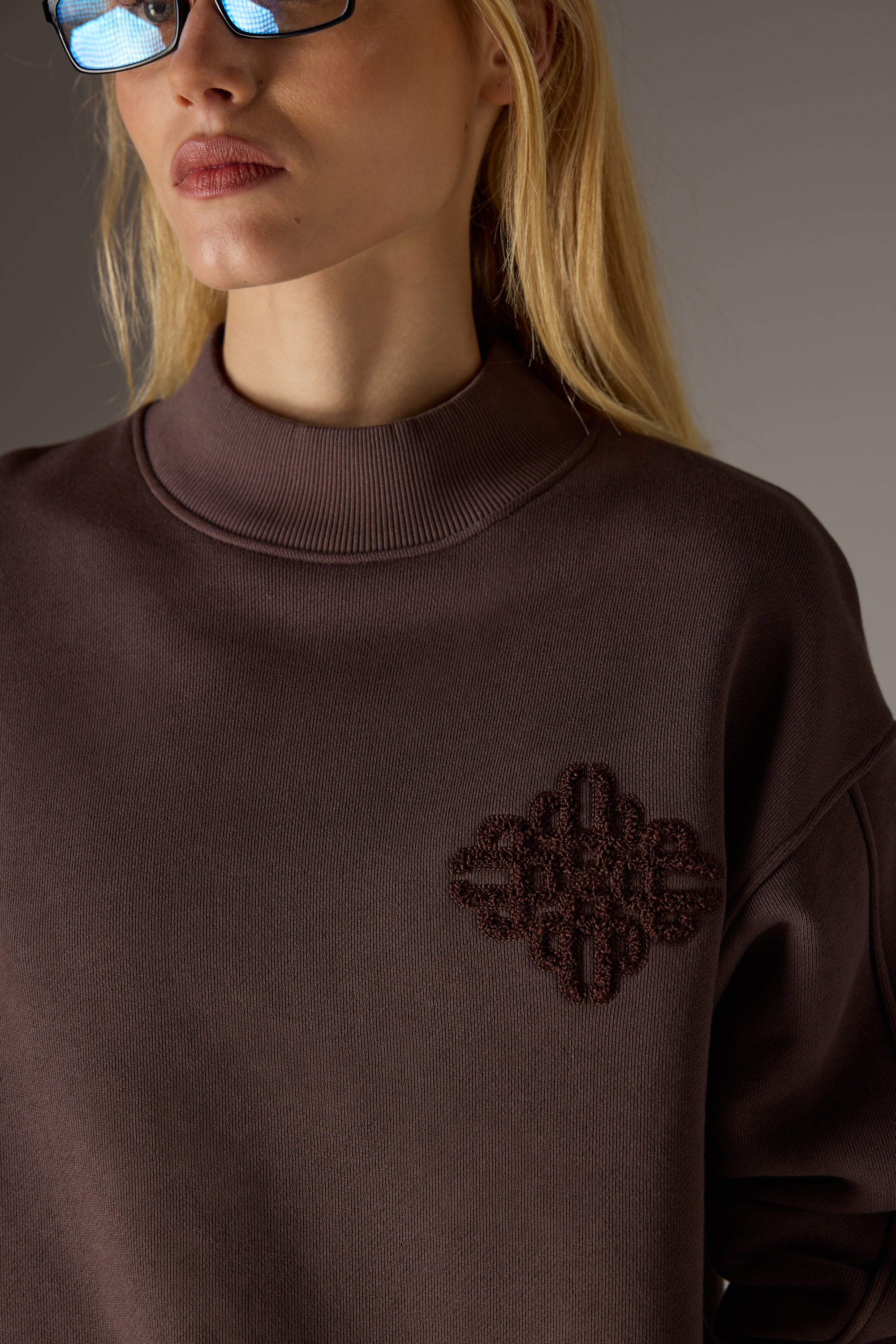 CHENILLE EMBLEM MOCK NECK CREW - CHOCOLATE
