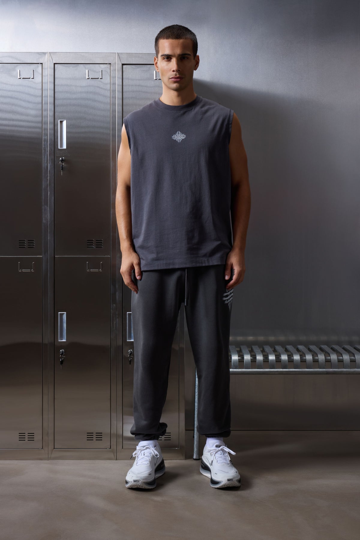 LUXURY IN MOTION EMBLEM VEST - CHARCOAL
