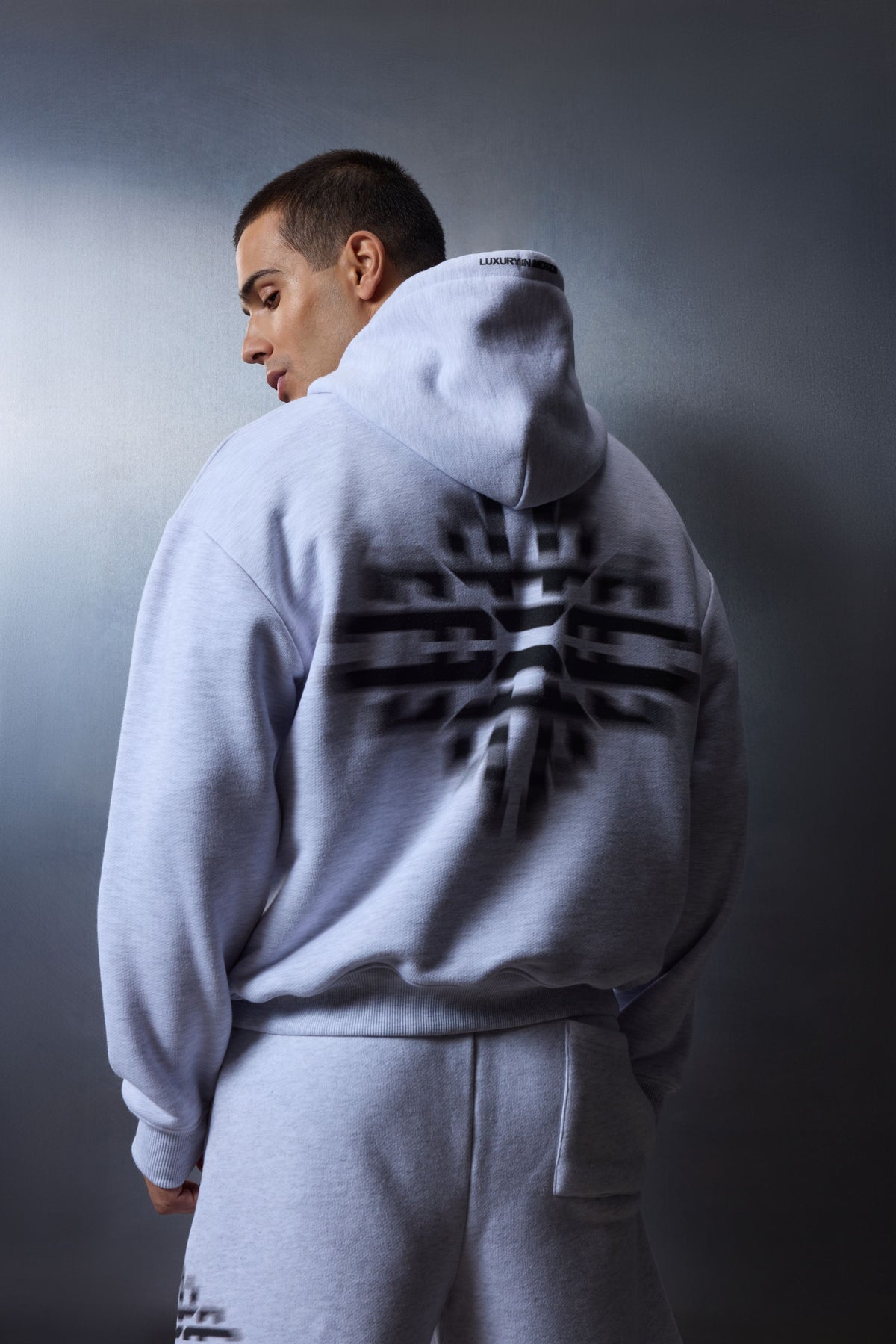 LUXURY IN MOTION GRAPHIC HOODIE - GREY MARL