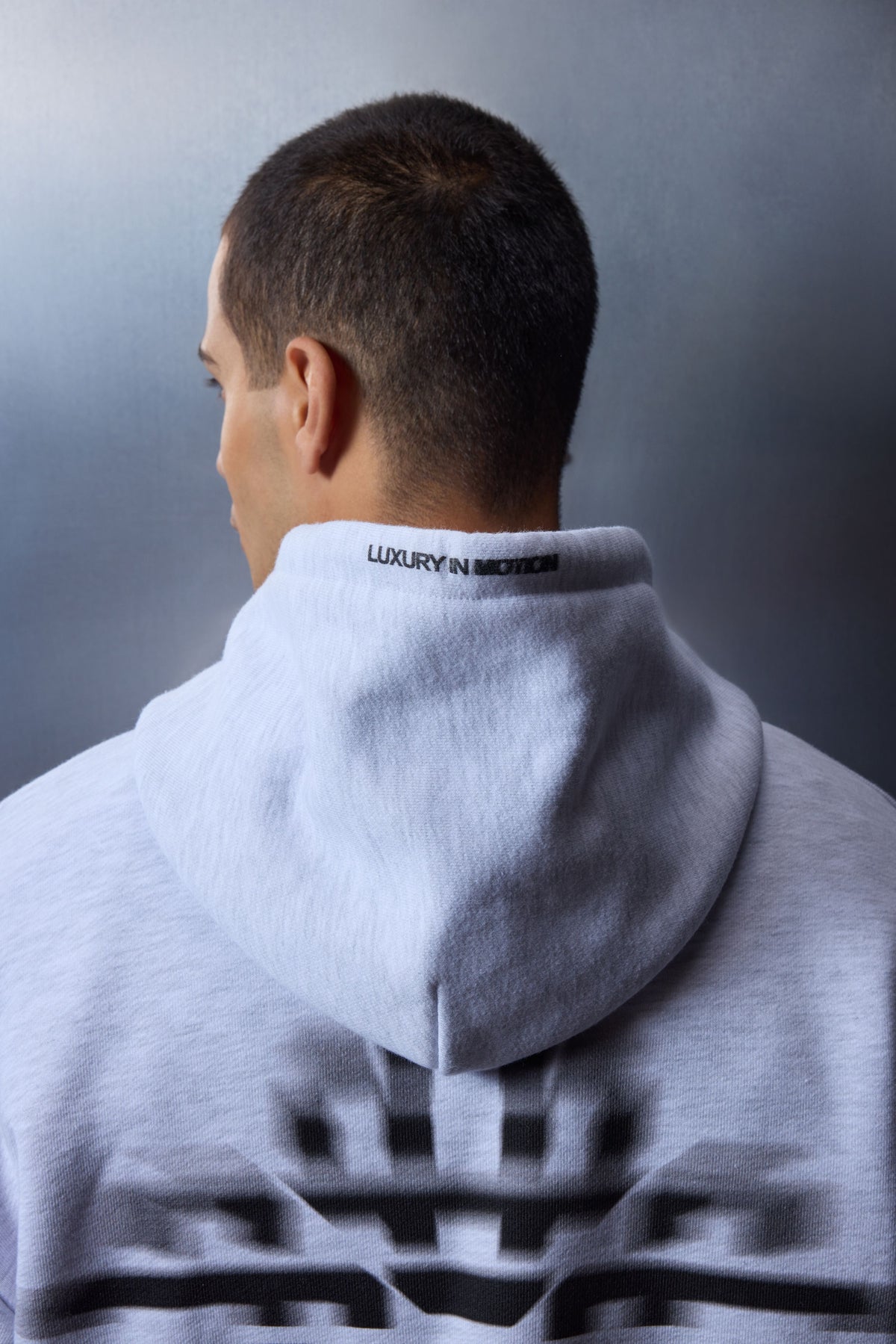 LUXURY IN MOTION GRAPHIC HOODIE - GREY MARL
