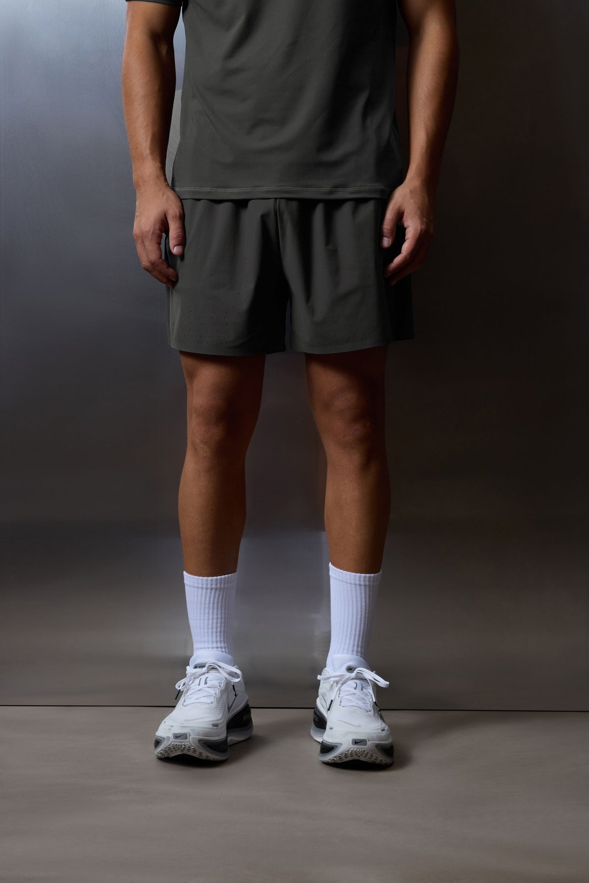 Men's Training Short in Charcoal – model front view, waist down