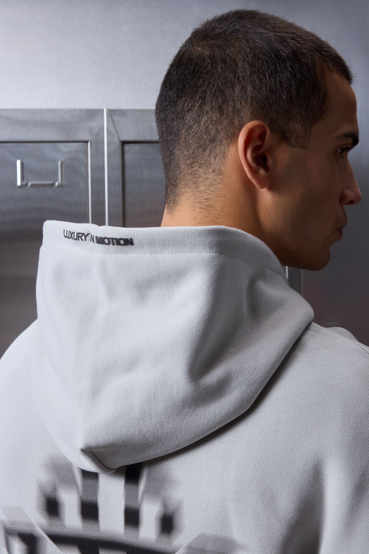 LUXURY IN MOTION GRAPHIC HOODIE - SALT