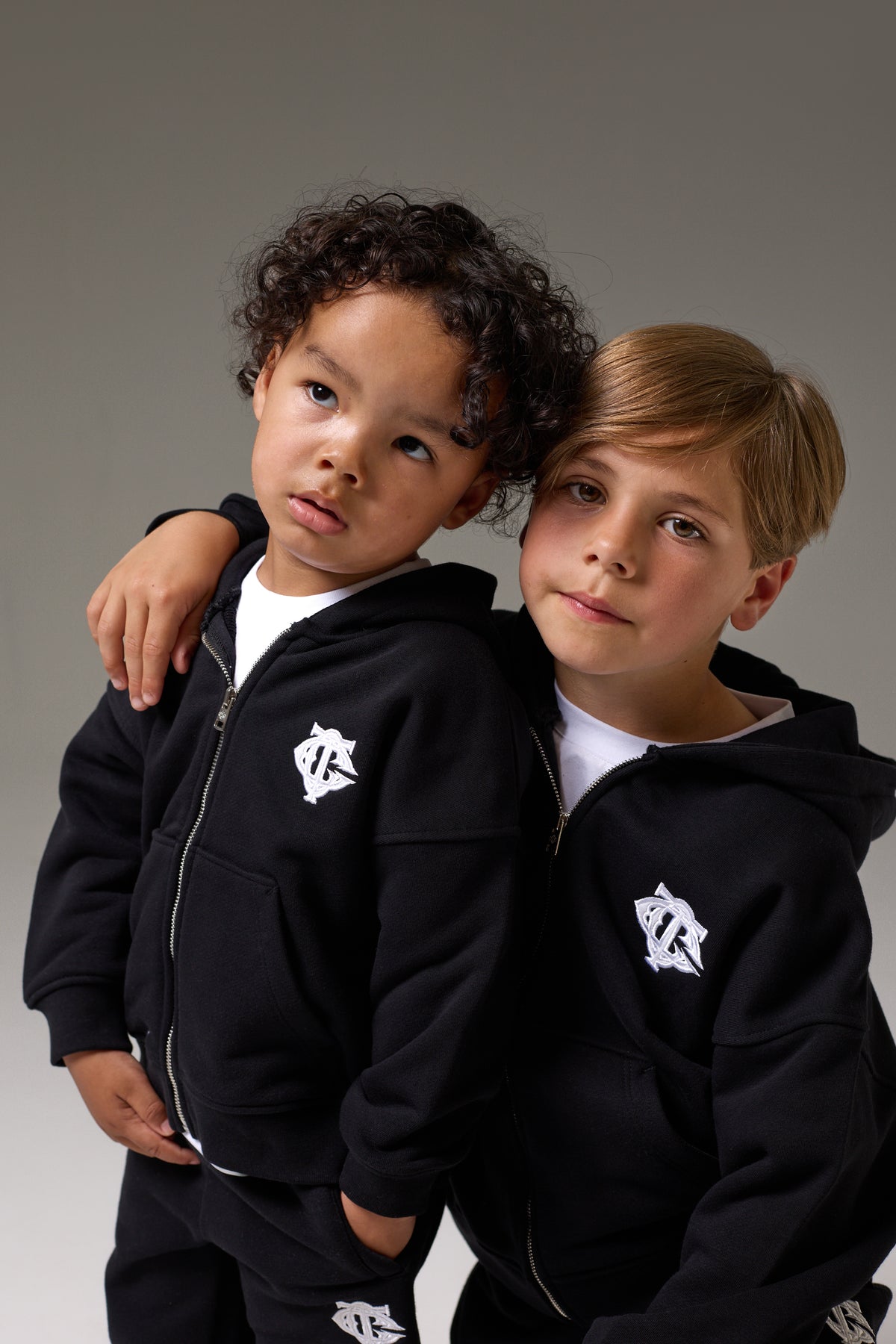 JUNIOR ZIP THROUGH EMBLEM APPLIQUE HOODIE - BLACK