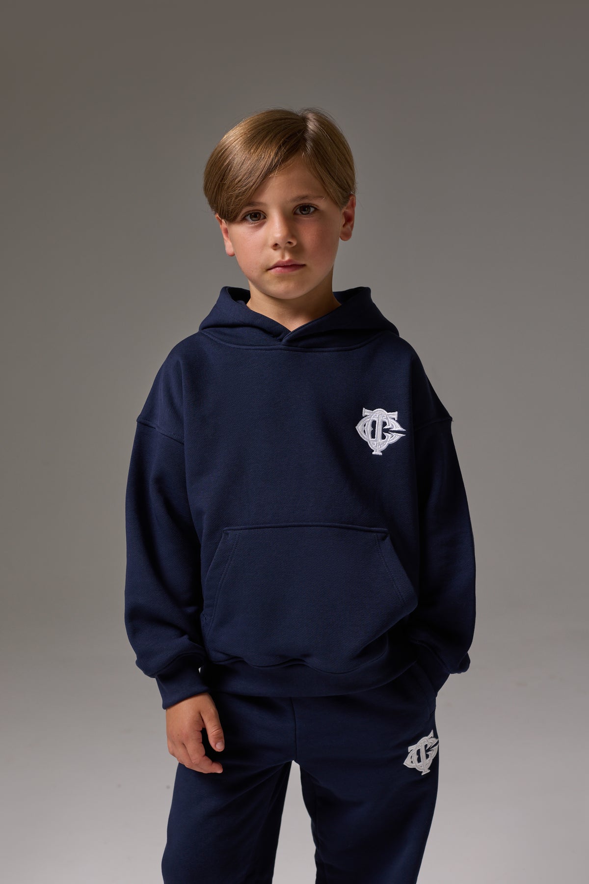 JUNIOR EMBLEM APPLIQUE HOODIE - NAVY