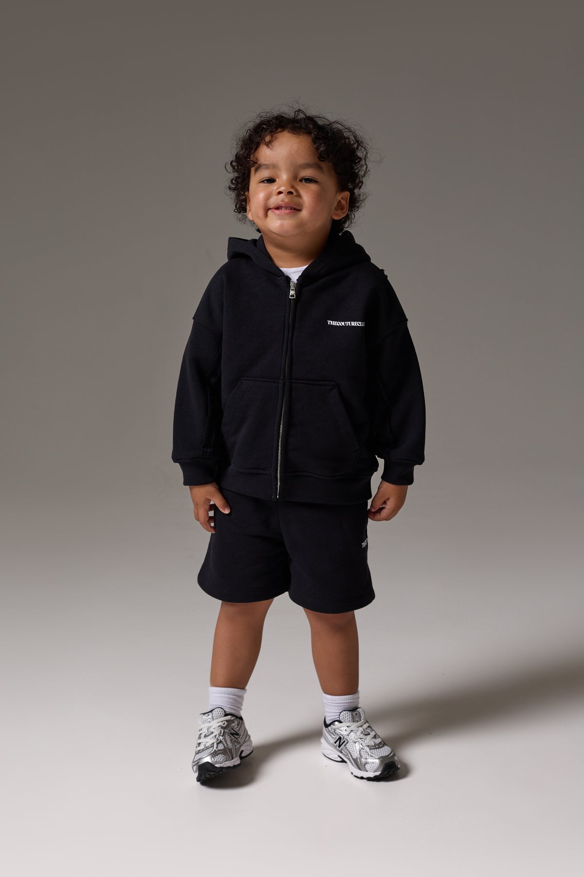 KIDS COPYRIGHT ZIP THROUGH HOODIE - BLACK