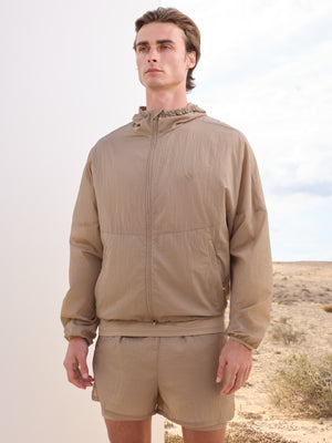 TRANSPARENT WINDBREAKER - SAND