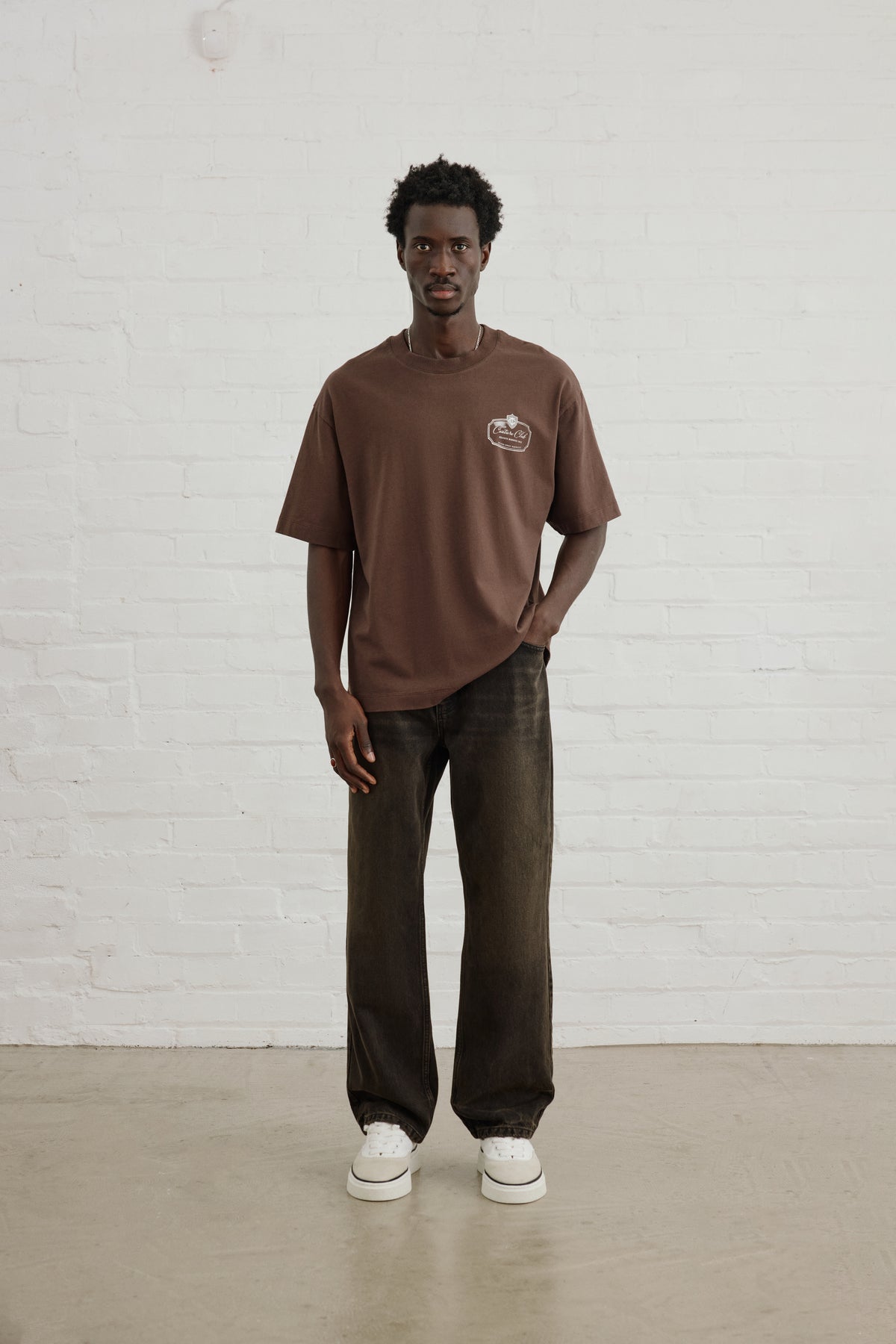 Men's Private Members Club T-Shirt in Brown – full-length model shot