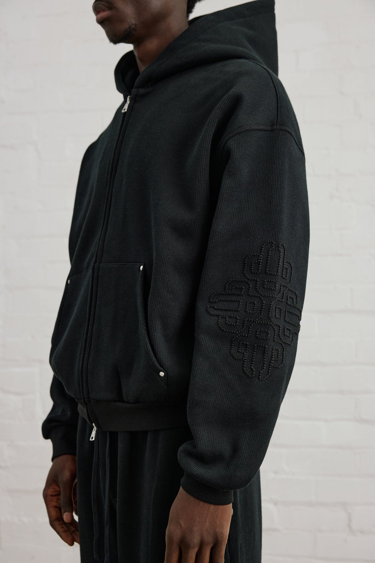KNIT FLEECEBACK EMBLEM ZIP THROUGH HOODIE - BLACK
