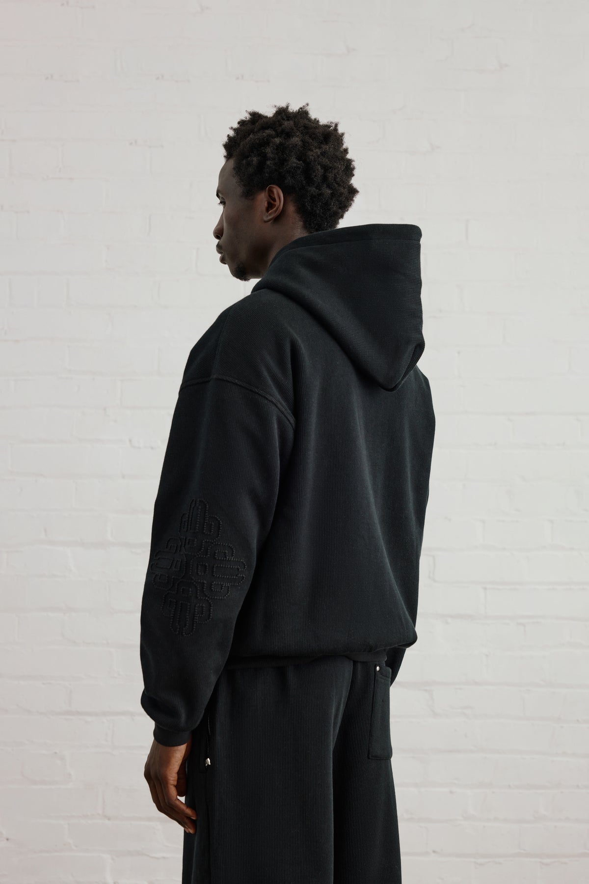 KNIT FLEECEBACK EMBLEM ZIP THROUGH HOODIE - BLACK