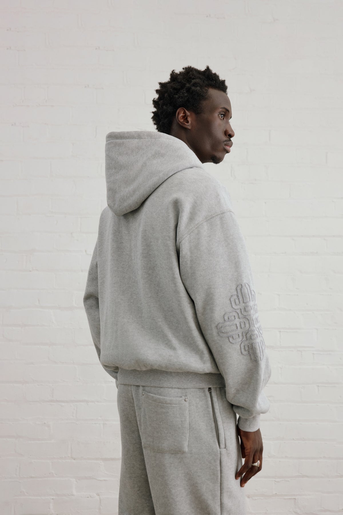 KNIT FLEECEBACK EMBLEM ZIP THROUGH HOODIE - GREY MARL