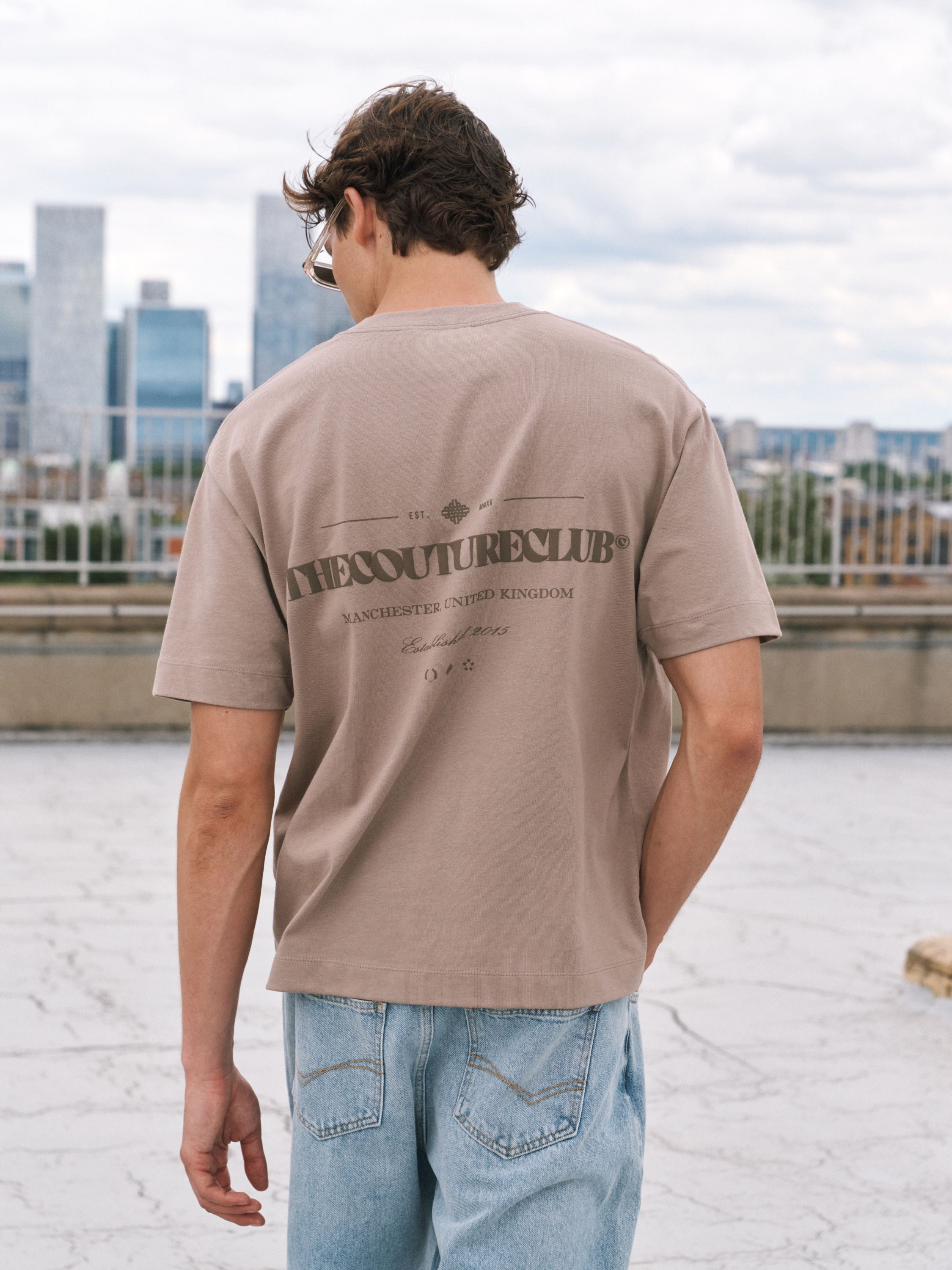 TONAL COPYRIGHT MULTI GRAPHIC T-SHIRT - BROWN