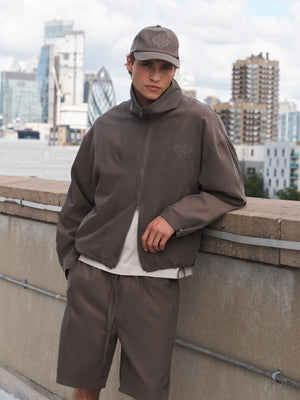 CUPRO FUNNEL NECK ZIP THROUGH - BROWN