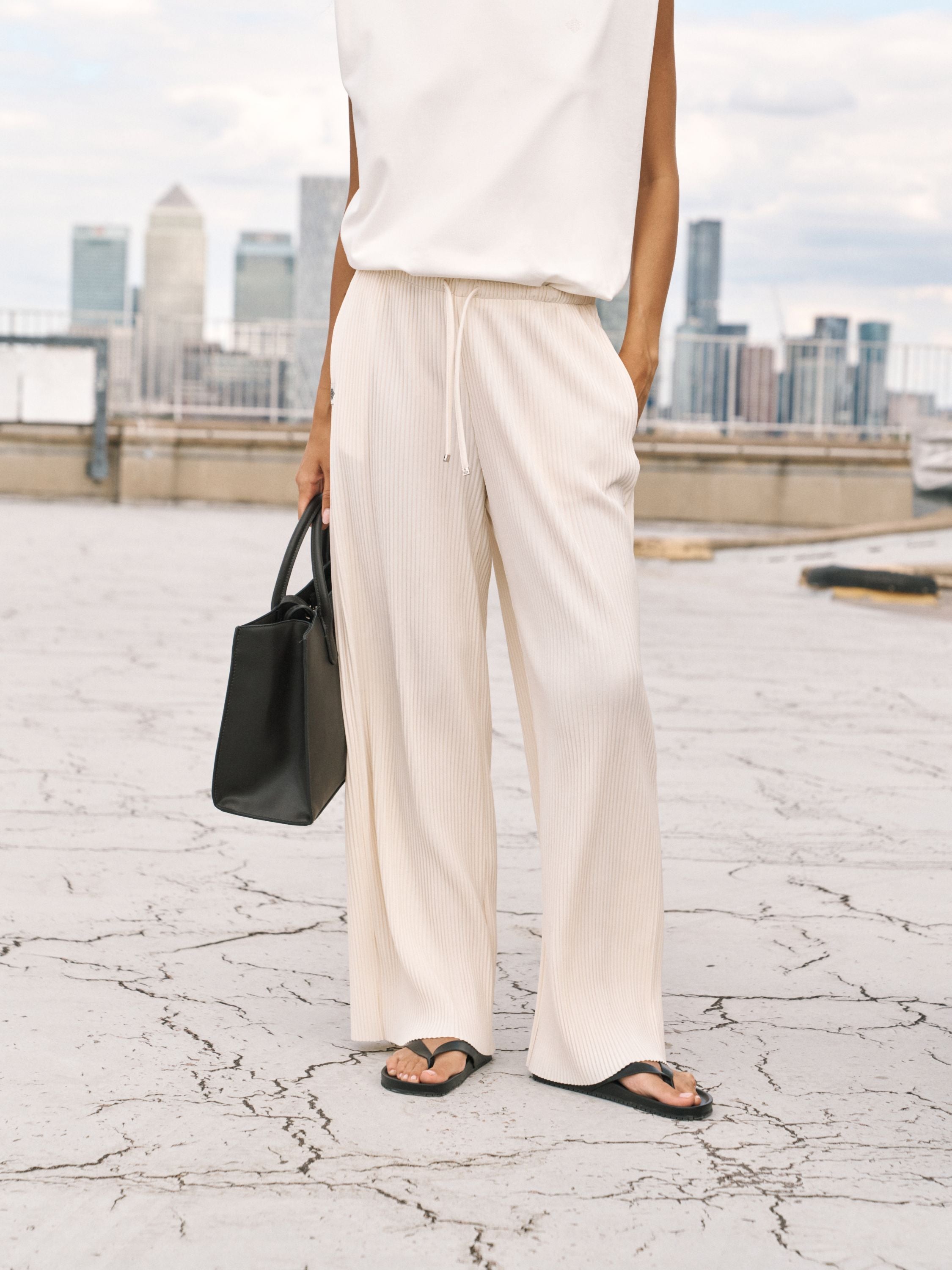 PLISSE TROUSERS - OFF WHITE
