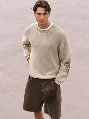 WASHED EMBLEM KNIT CREW - BEIGE