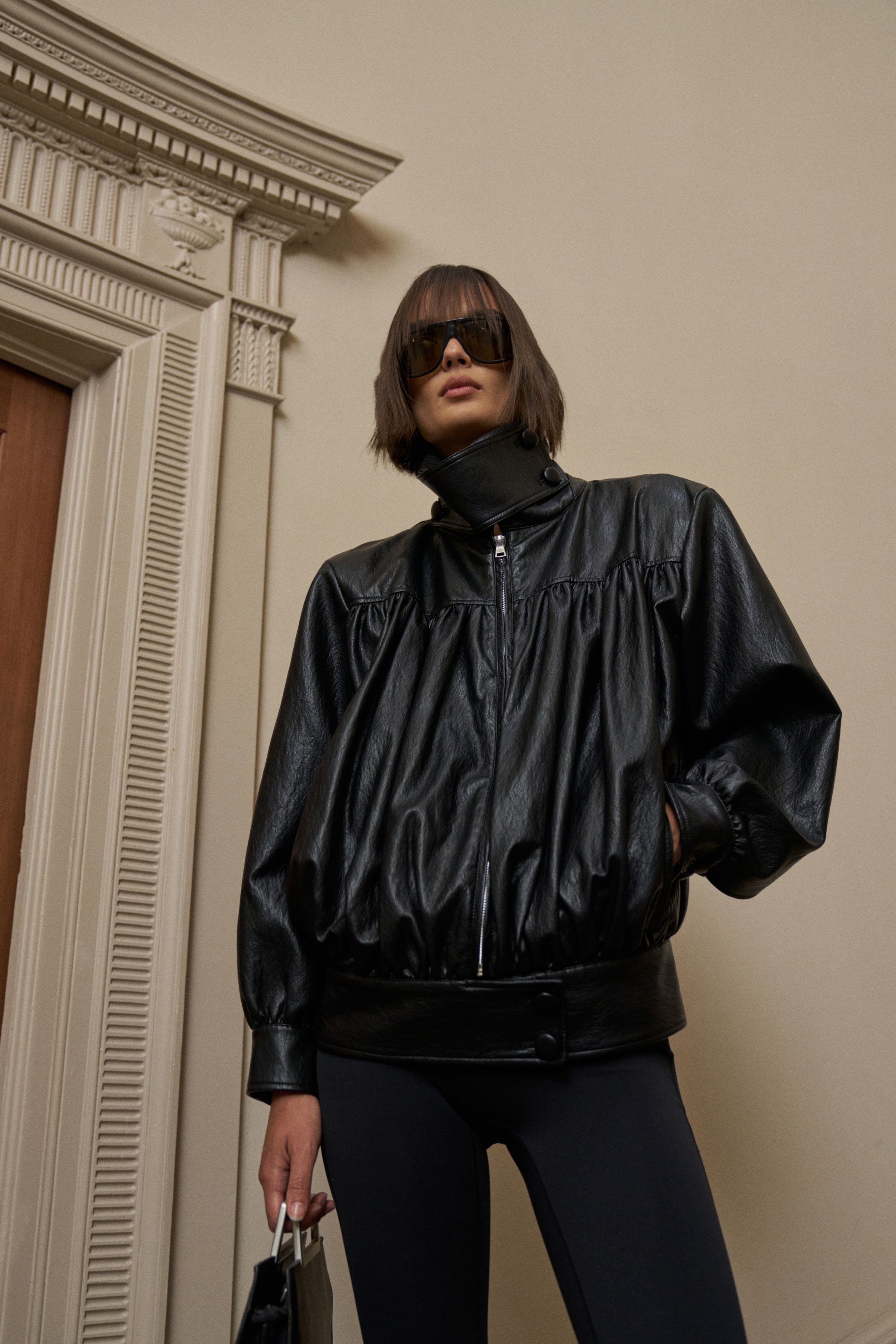 RUCHED FUNNEL NECK FAUX LEATHER JACKET - BLACK