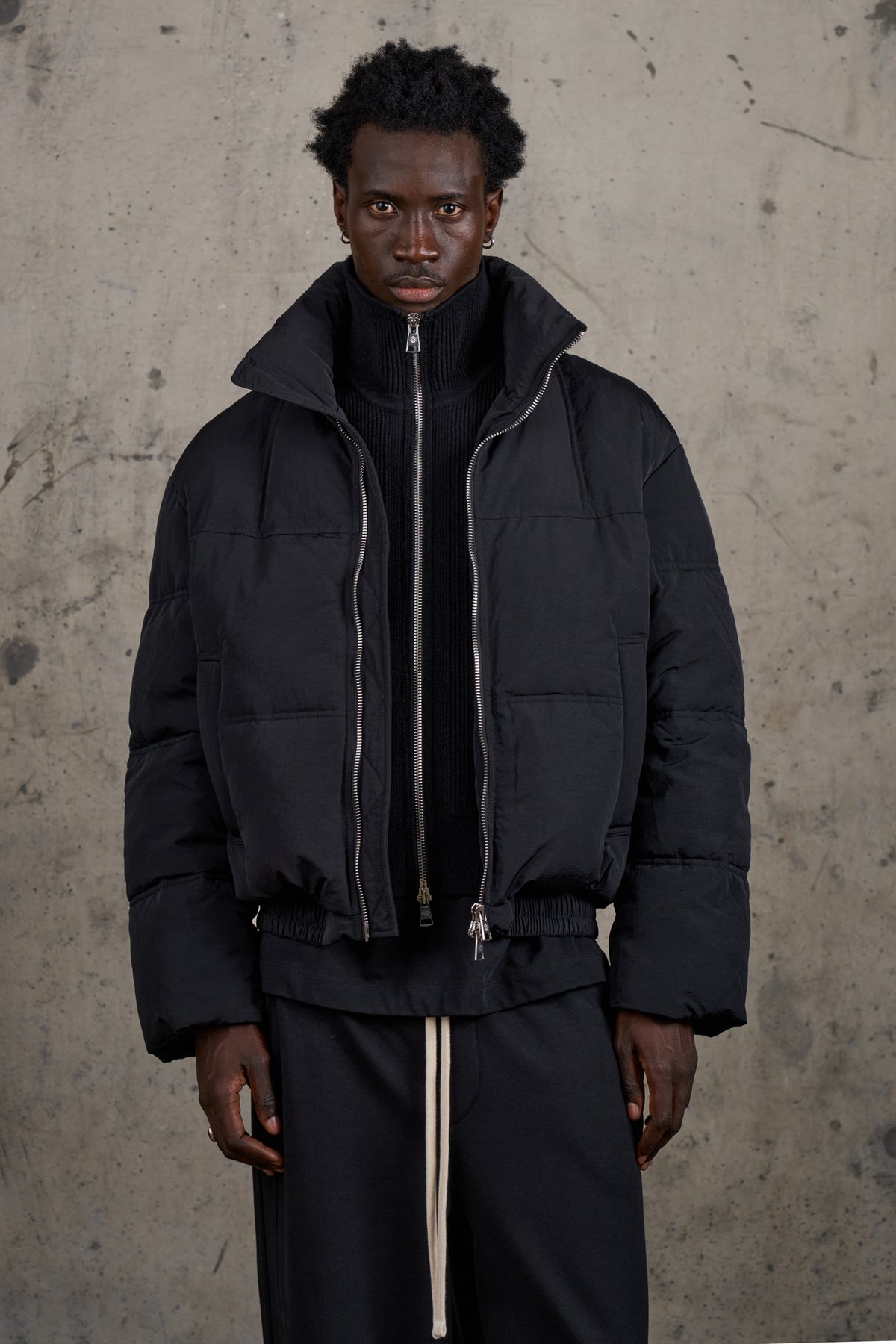 KNITTED PANEL PUFFER COAT - BLACK