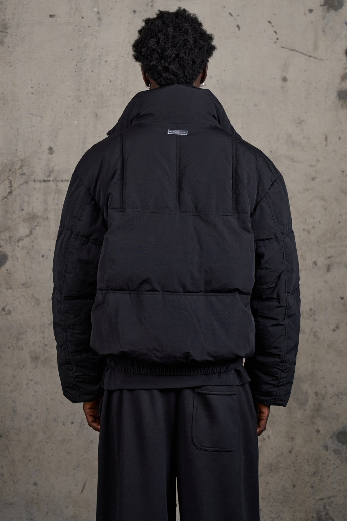 KNITTED PANEL PUFFER COAT - BLACK