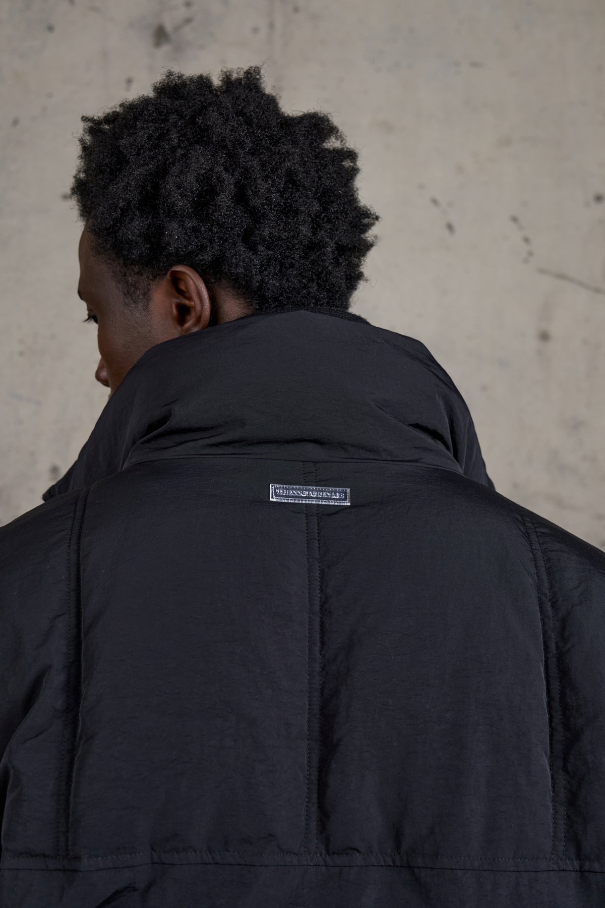 KNITTED PANEL PUFFER COAT - BLACK