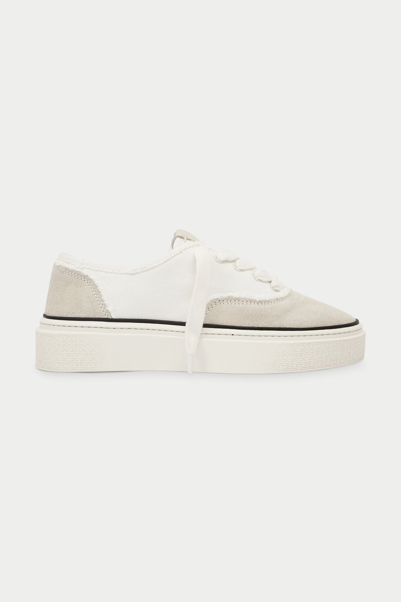 Pair of white and beige sneakers and black accents on a white background.