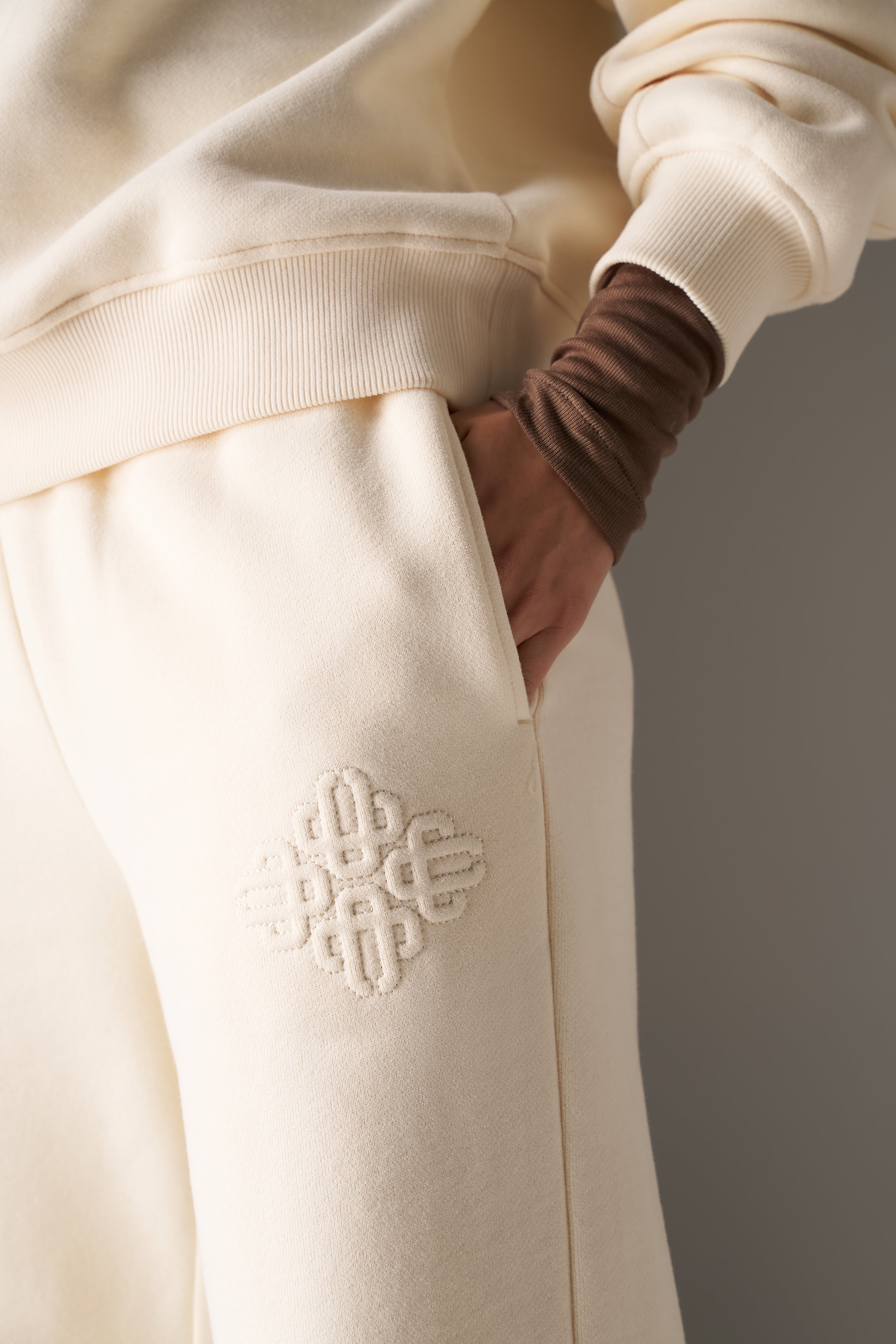 RAISED EMBLEM JOGGERS - BUTTERMILK