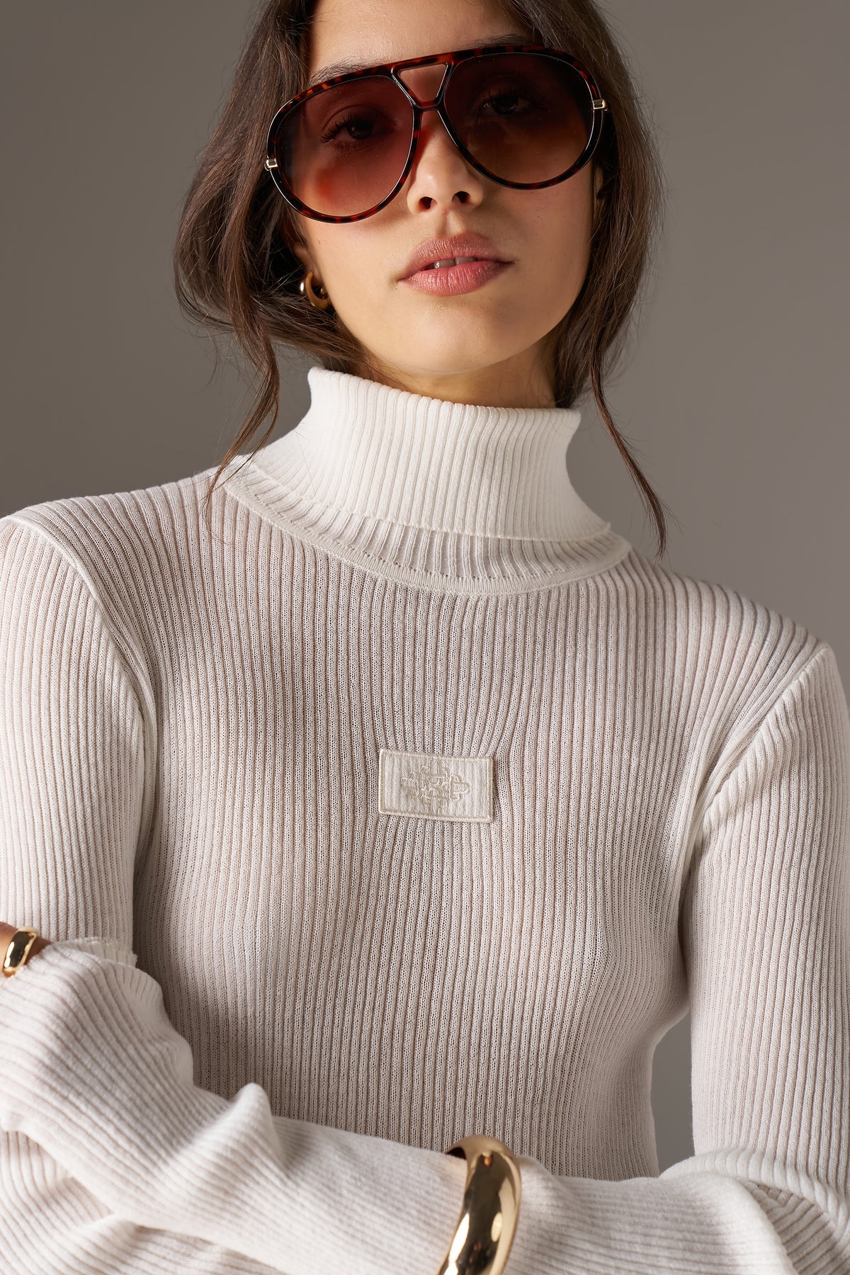 RIBBED ROLL NECK TOP - BONE