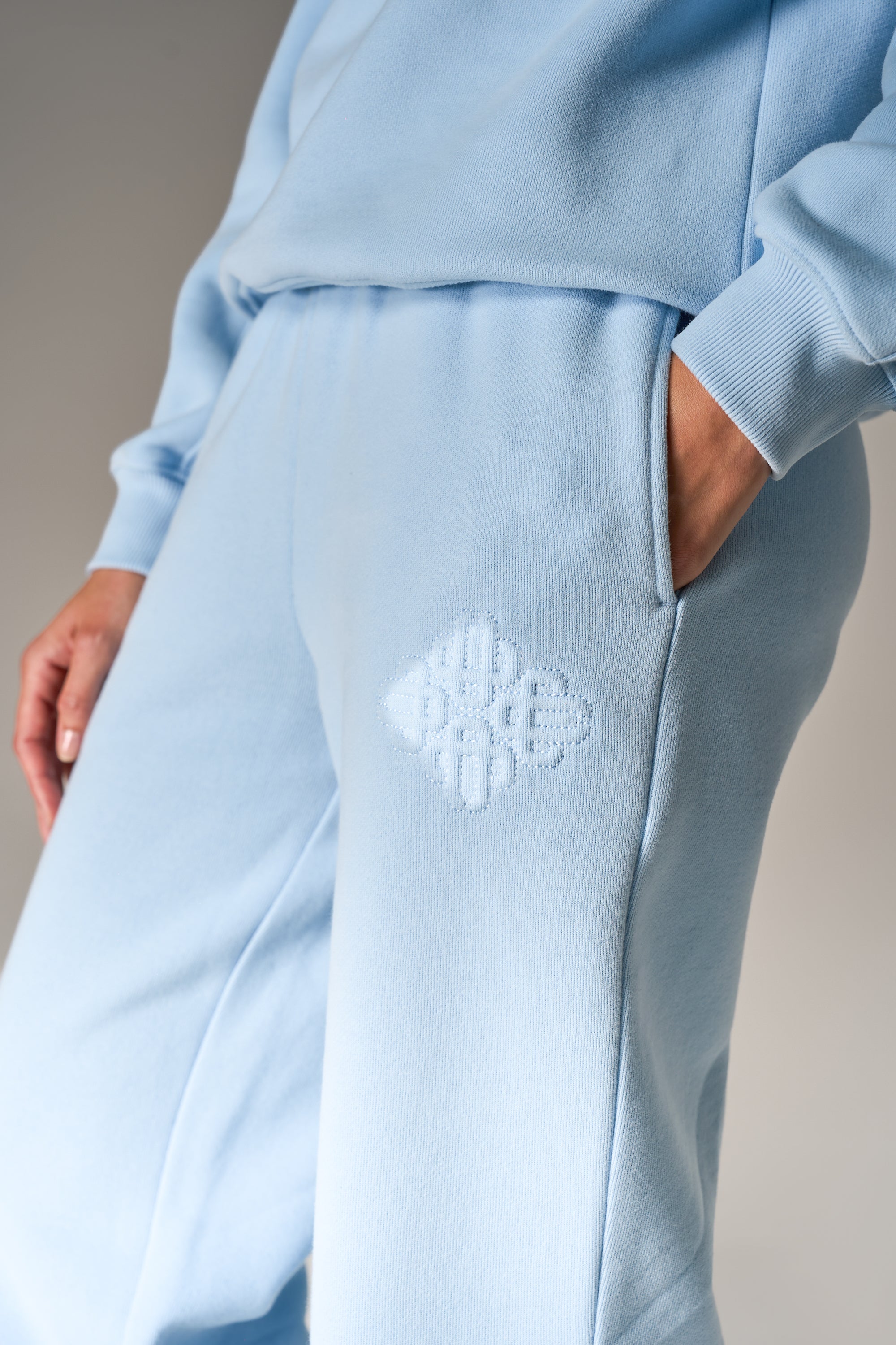 RAISED EMBLEM JOGGERS - POWDER BLUE
