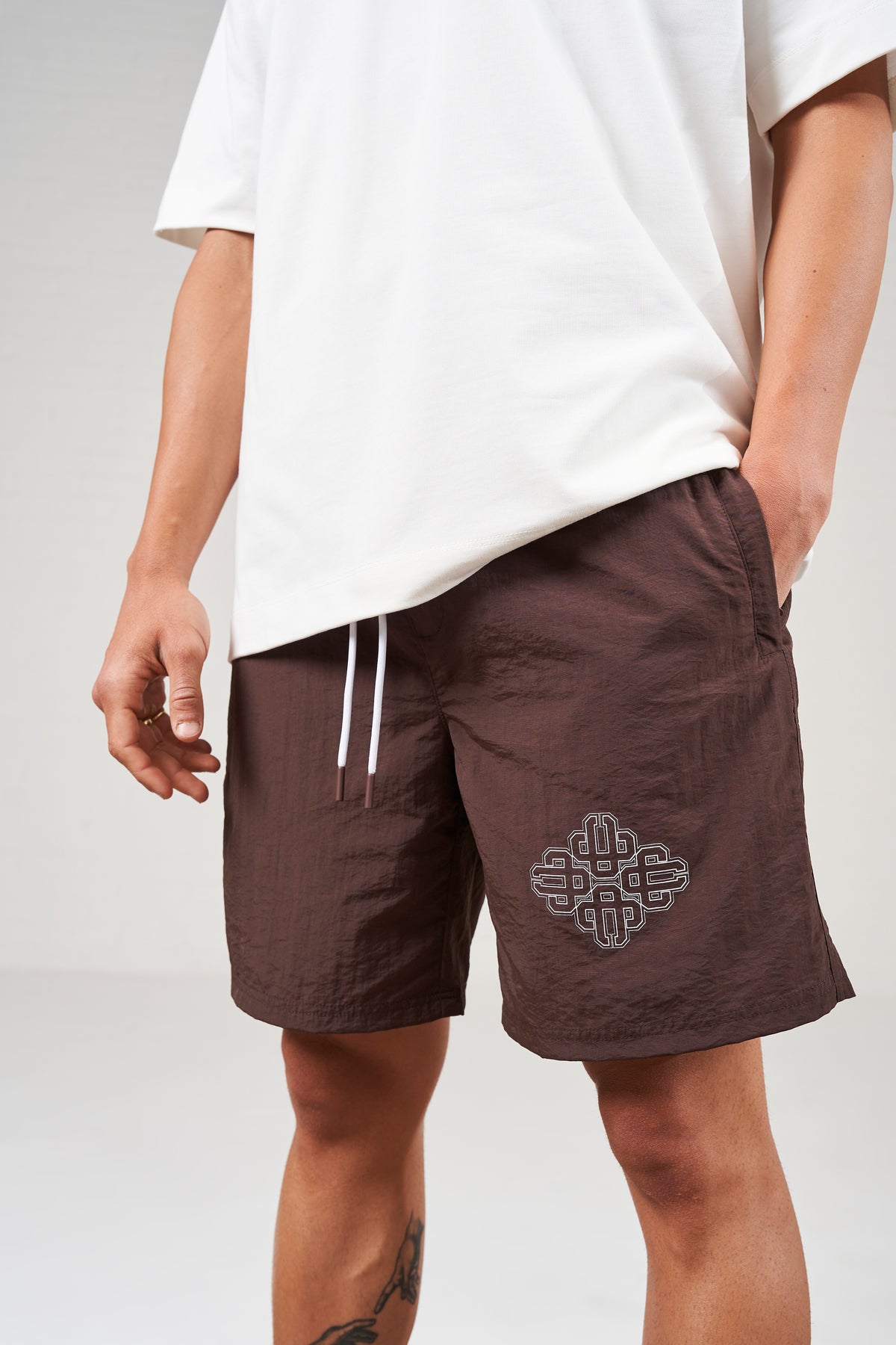COPYRIGHT EMBLEM MID LENGTH SWIM SHORTS - BROWN