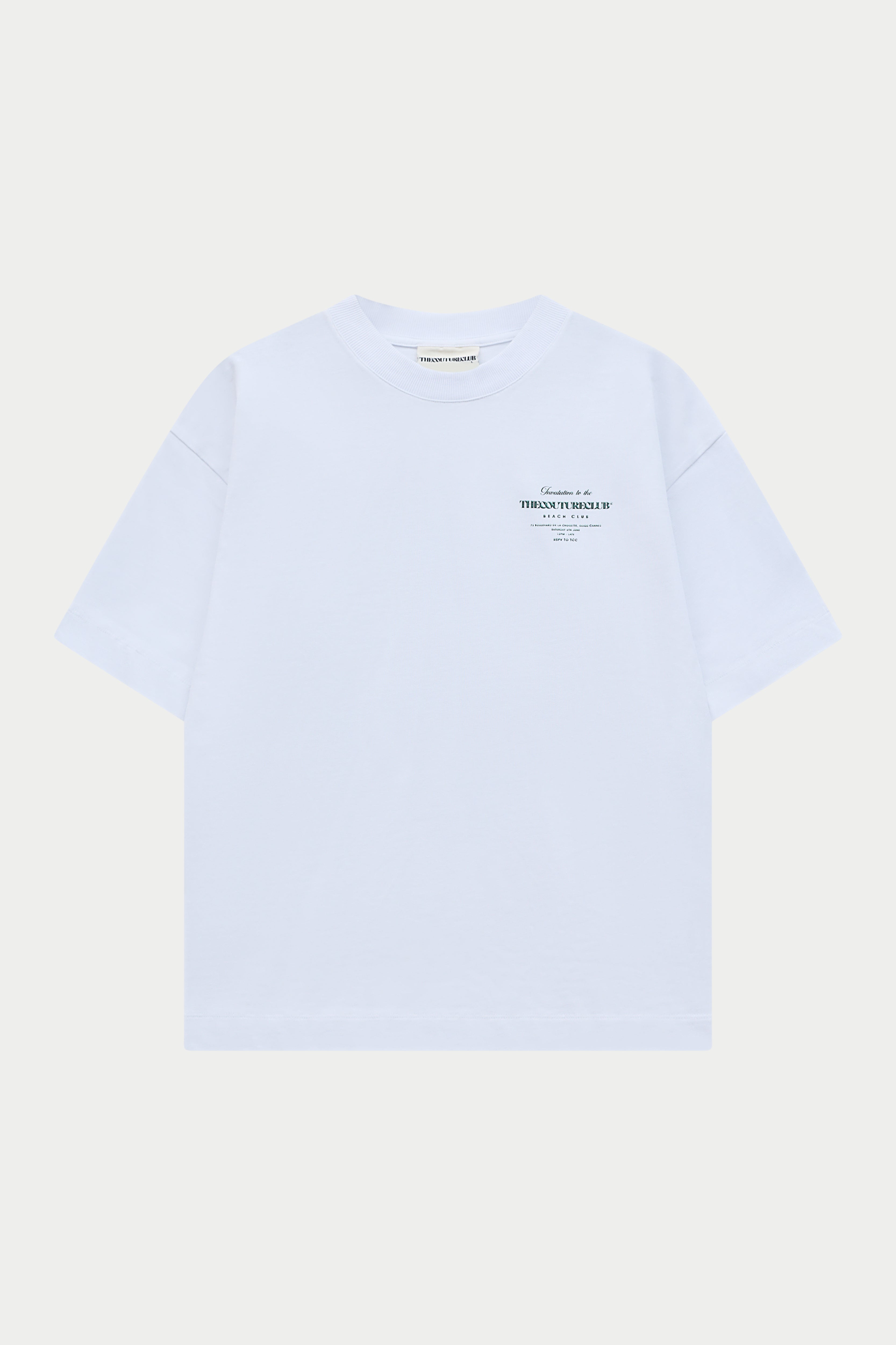 White t-shirt with green text on a white background