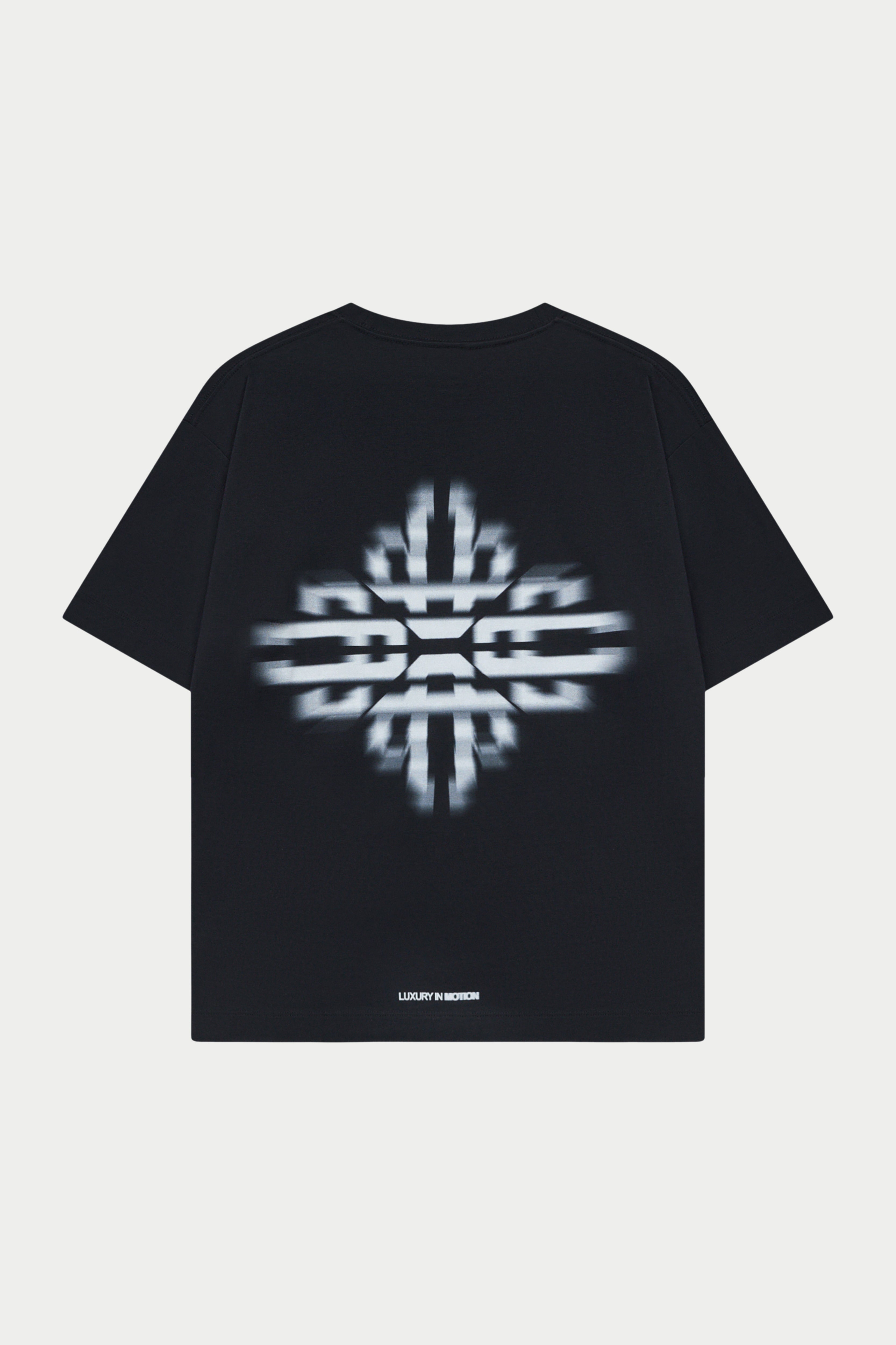 Black t-shirt with a white geometric design on the back against a white background
