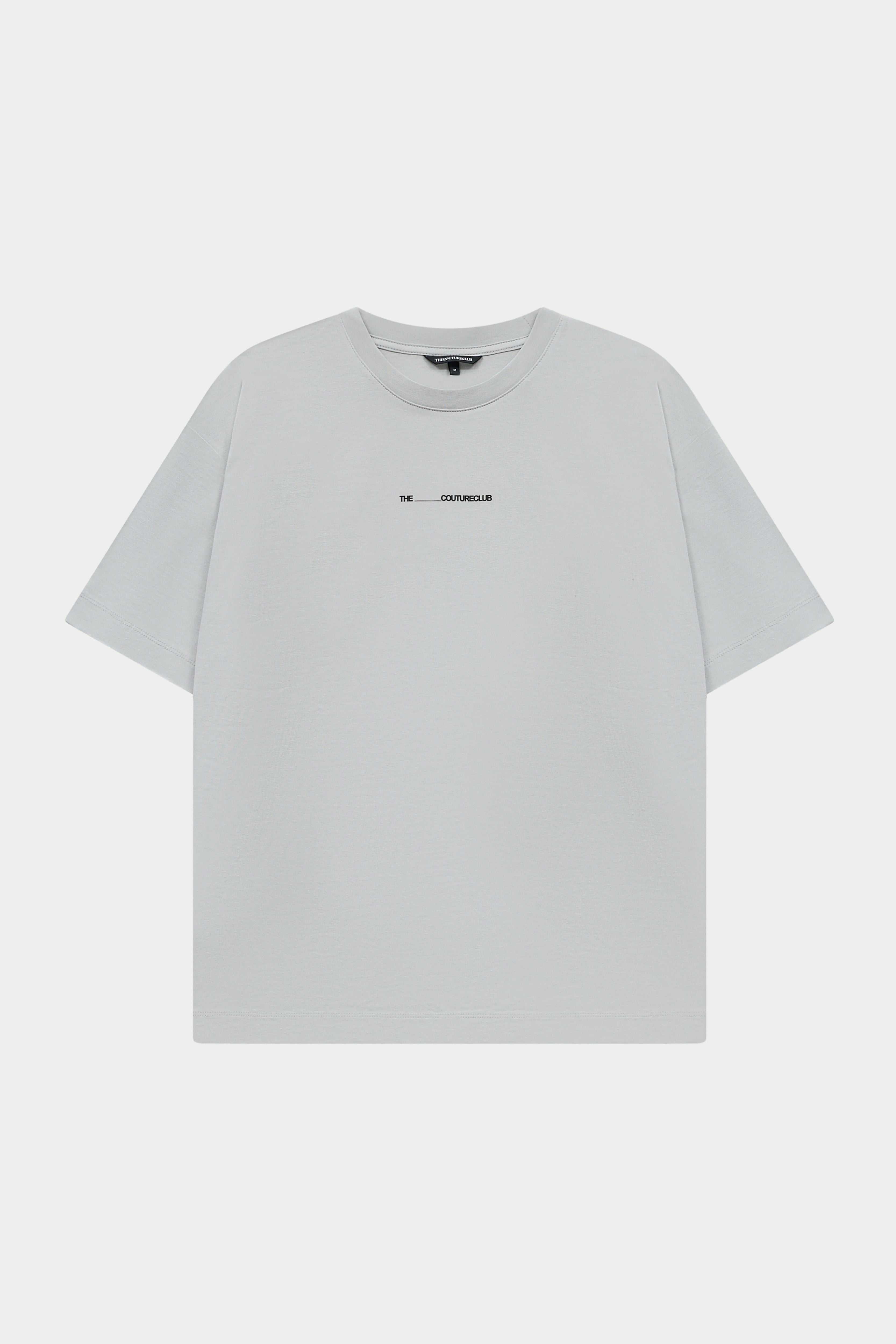 Light grey t-shirt with a small black logo on a white background