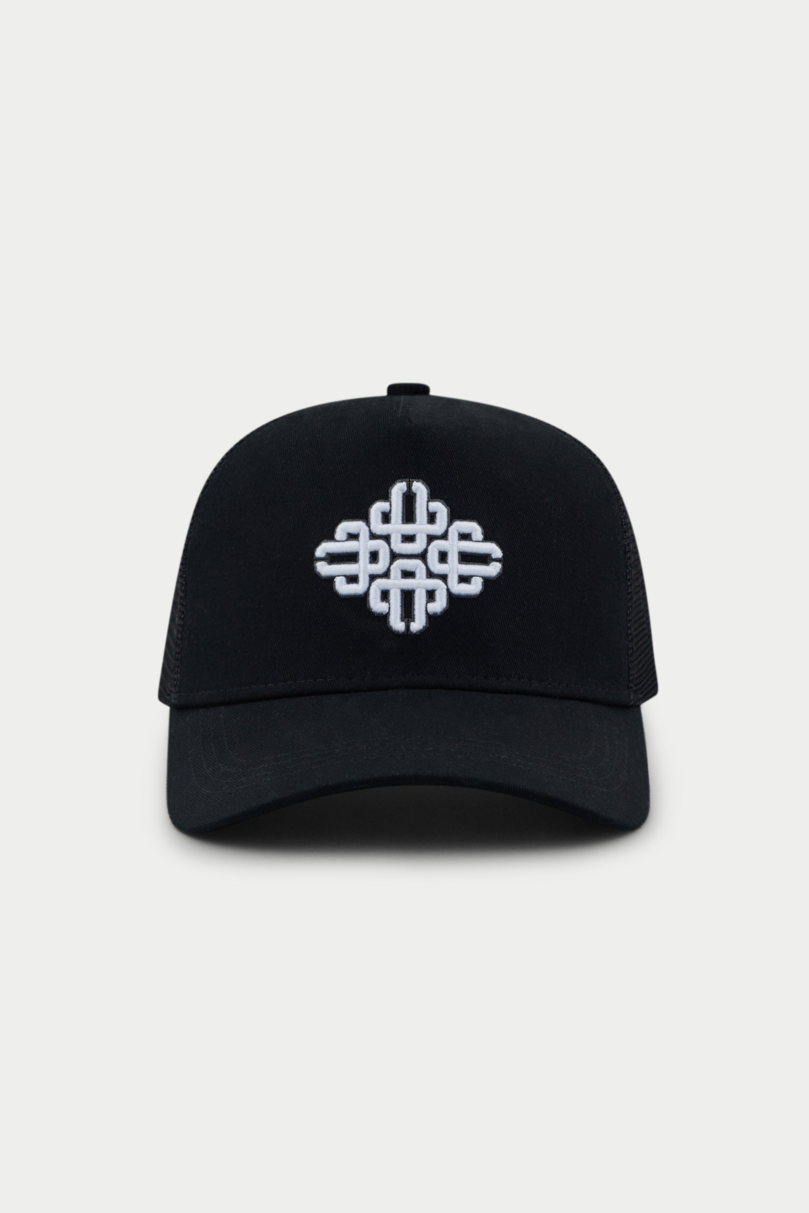 Black cap with a white embroidered branding on a white background