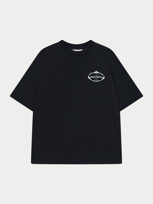 Black t-shirt with a small white logo on a white background