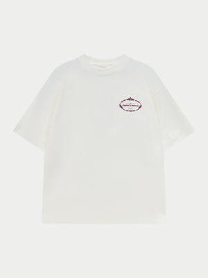 White t-shirt with a burgundy logo on a white background