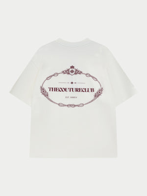 White t-shirt with a burgundy decorative logo and text on a white background