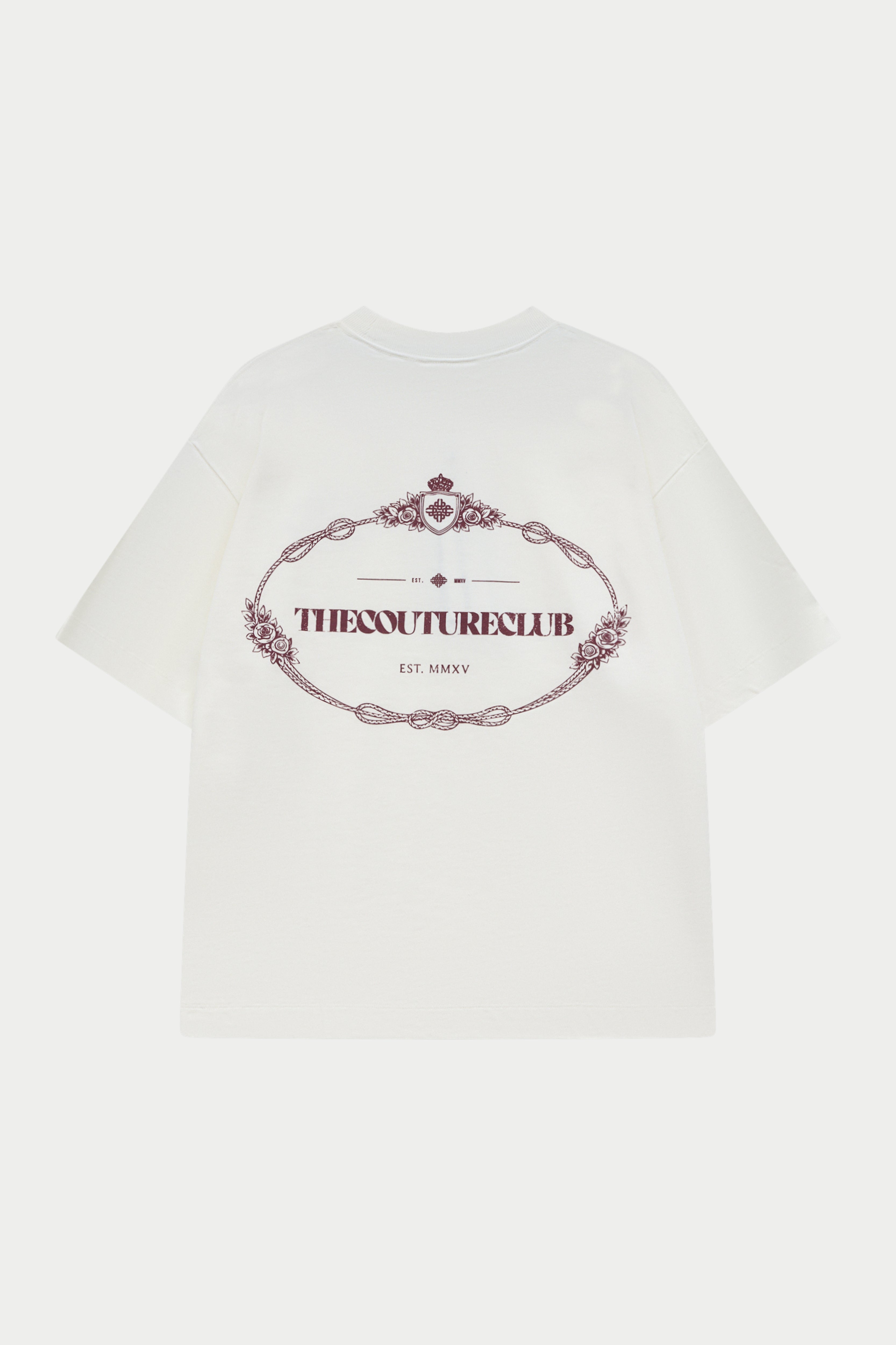 White t-shirt with a burgundy decorative logo and text on a white background