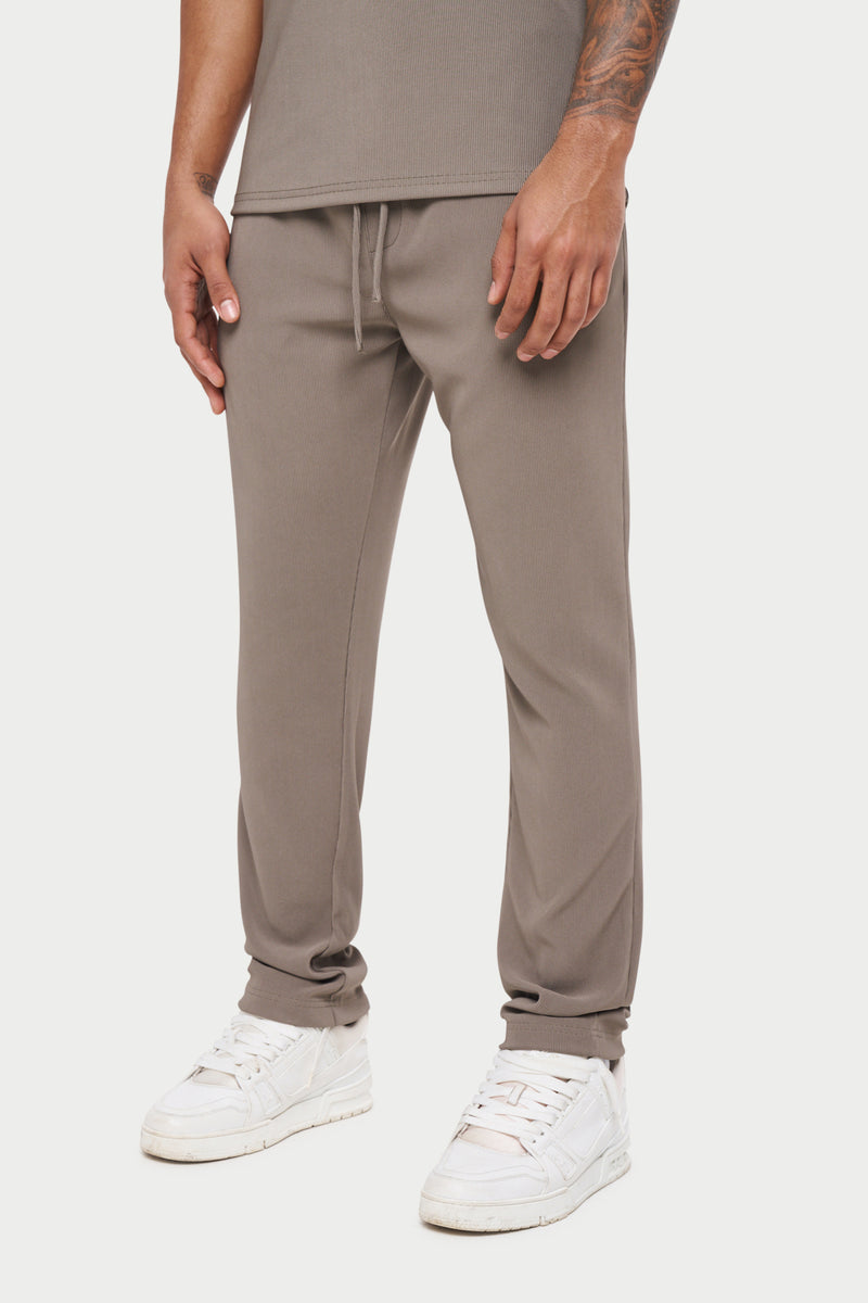 RIB TEXTURED TAPERED TROUSERS - GREY