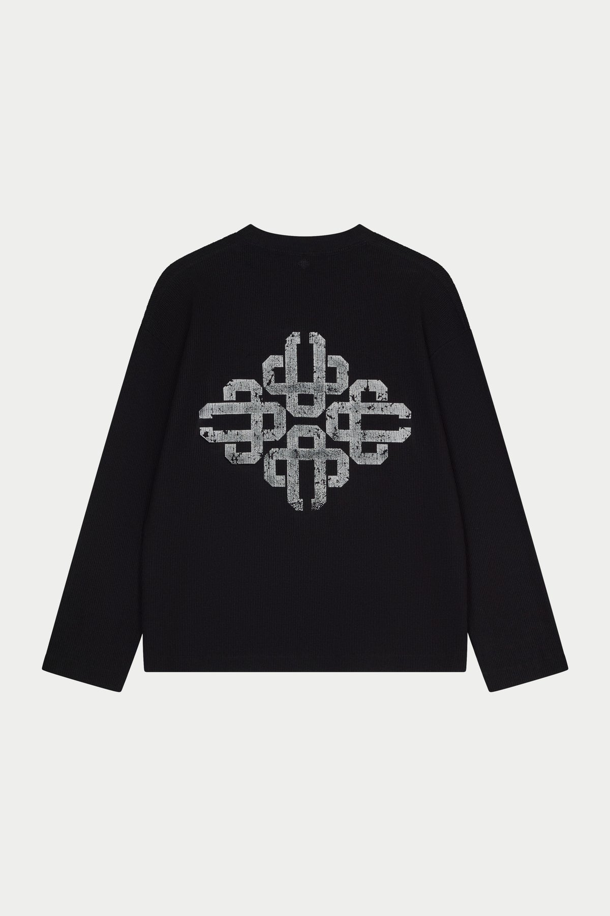 Black t-shirt with a central pattern on a white background