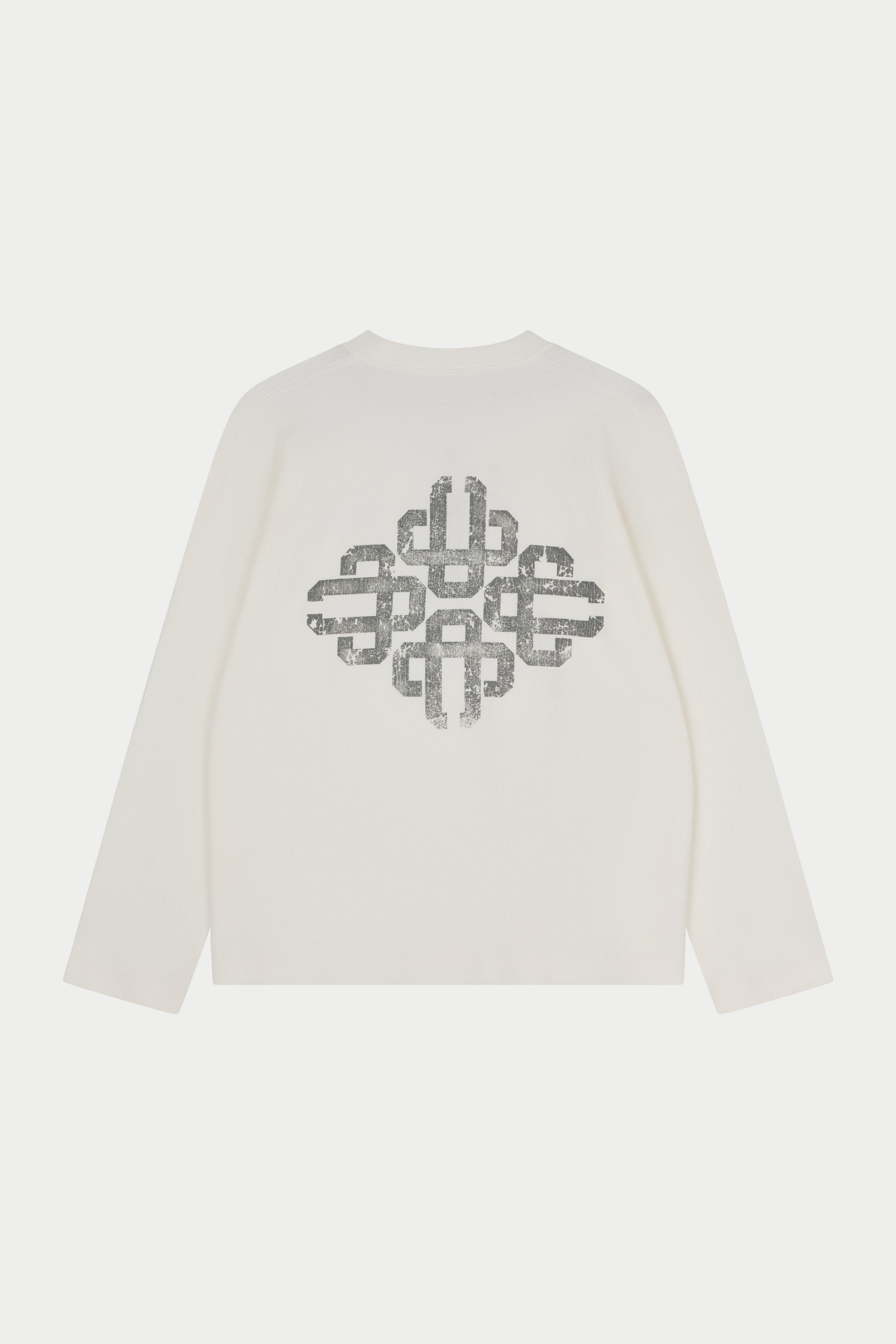 White t-shirt with a decorative logo on the back against a white background