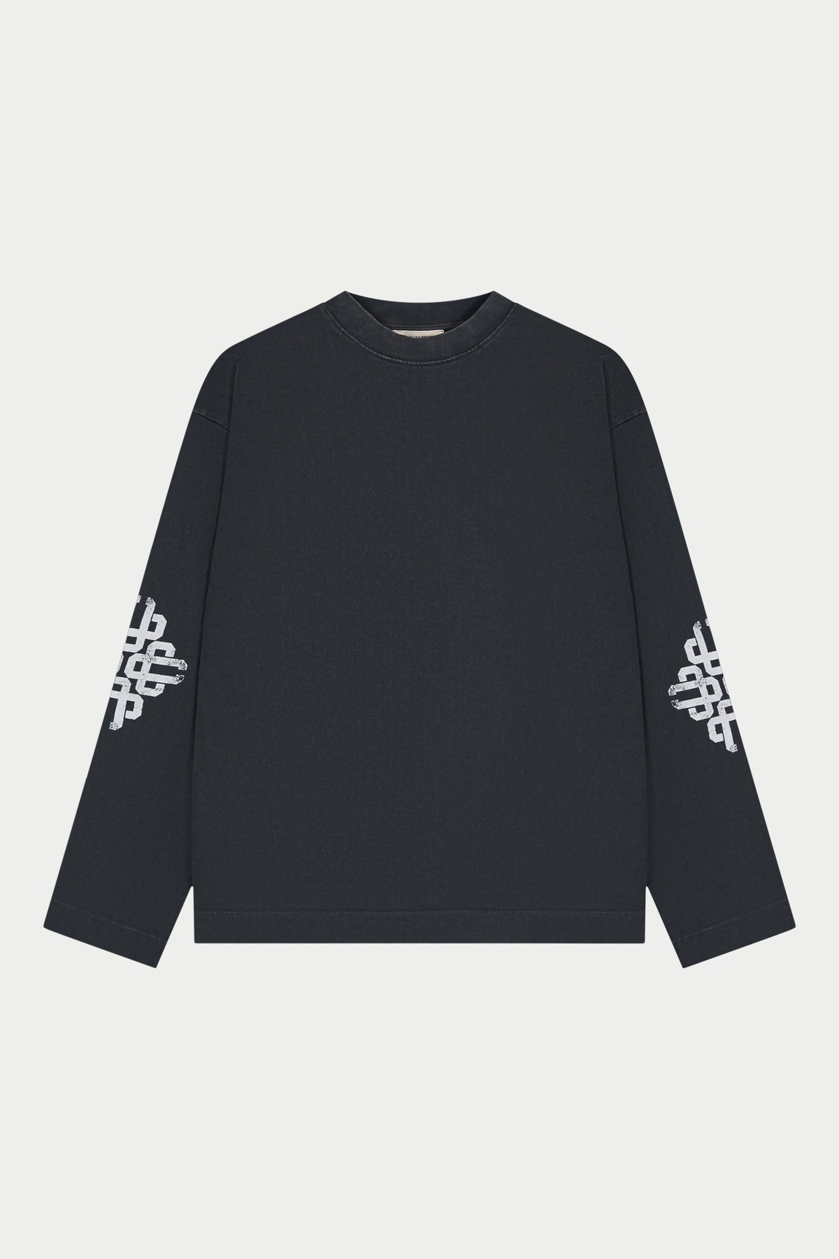 Black long-sleeve shirt with white patterns on sleeves against a white background