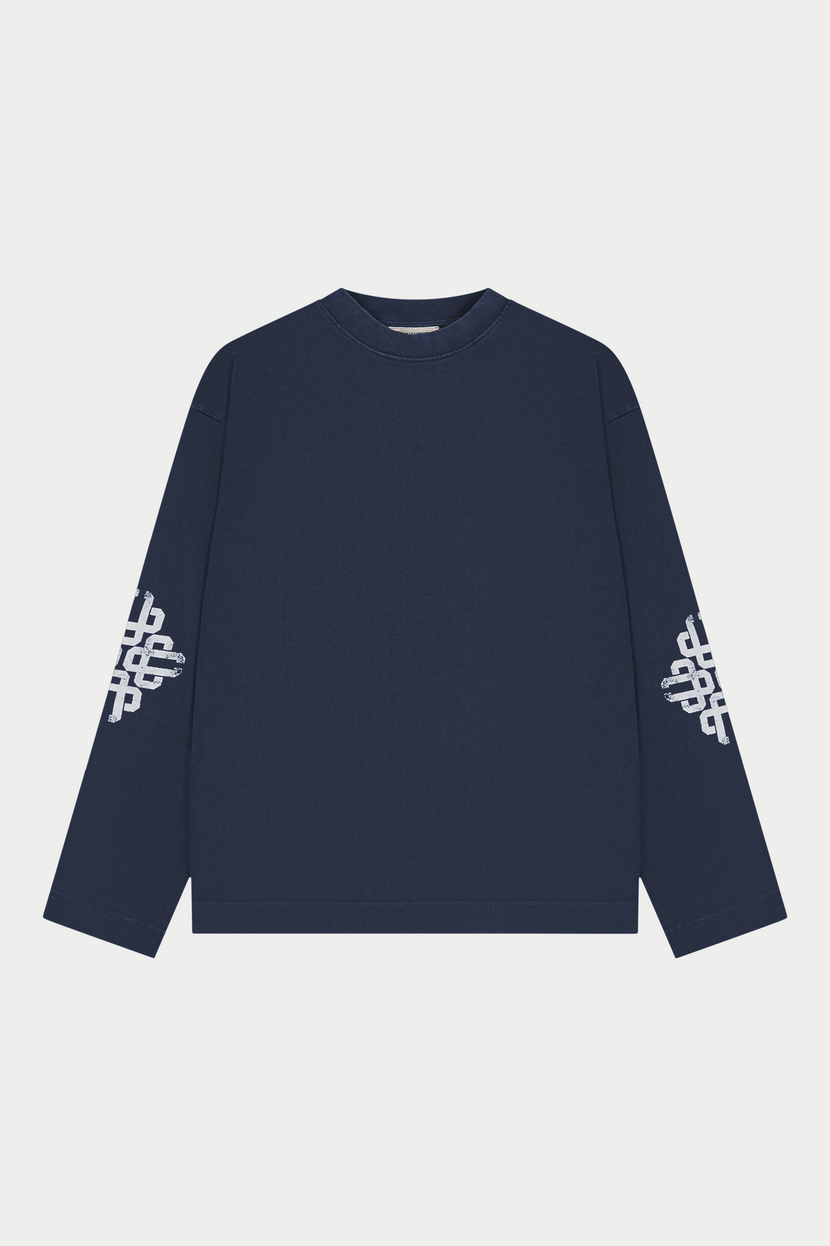 Navy long-sleeve shirt with white patterns on sleeves against a light gray background