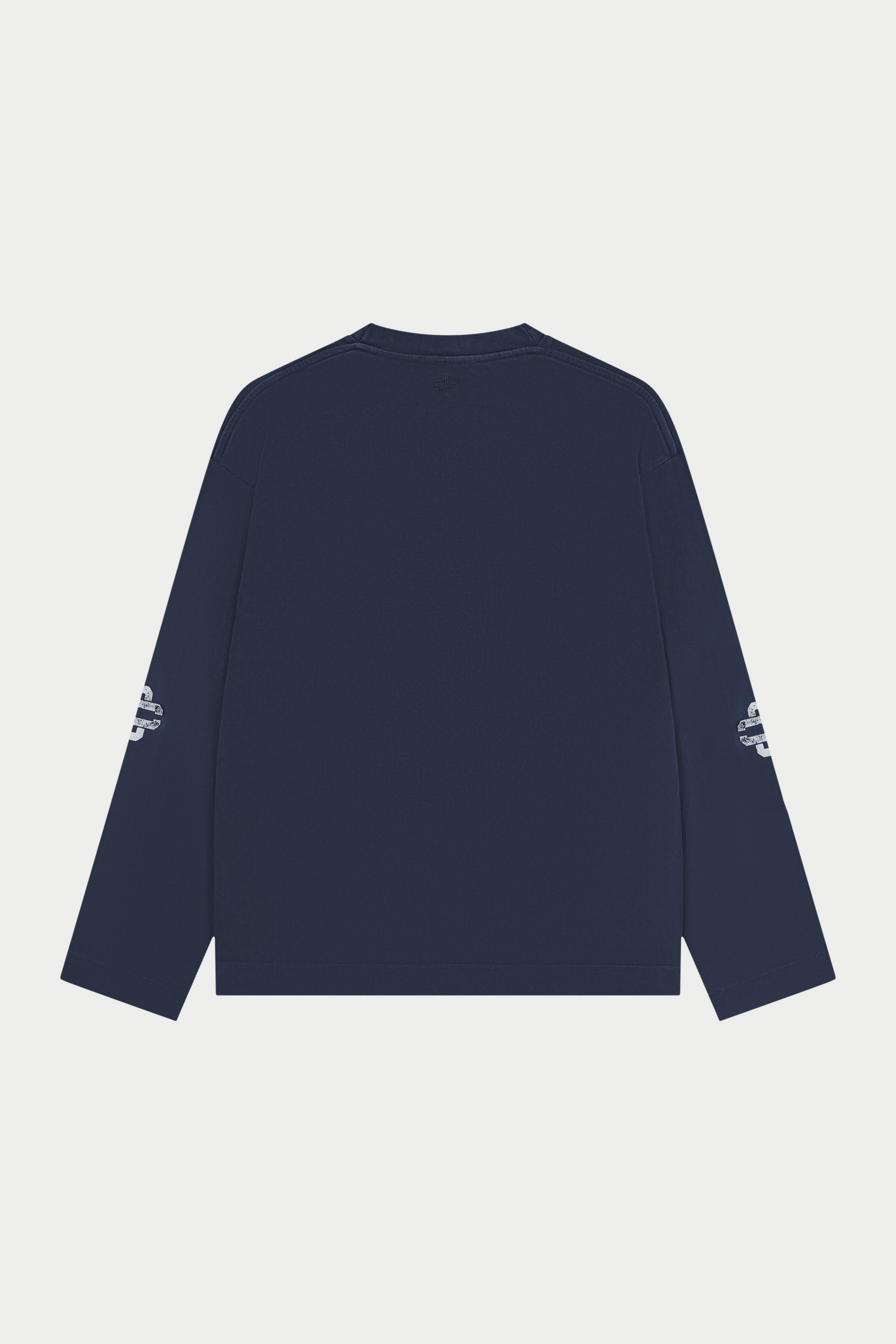 Navy long-sleeve shirt with white text on sleeves against a light gray background